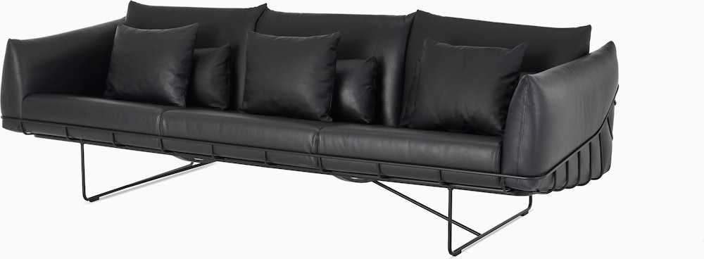 Wireframe Sofa three seater with black leather cushions and black frame.