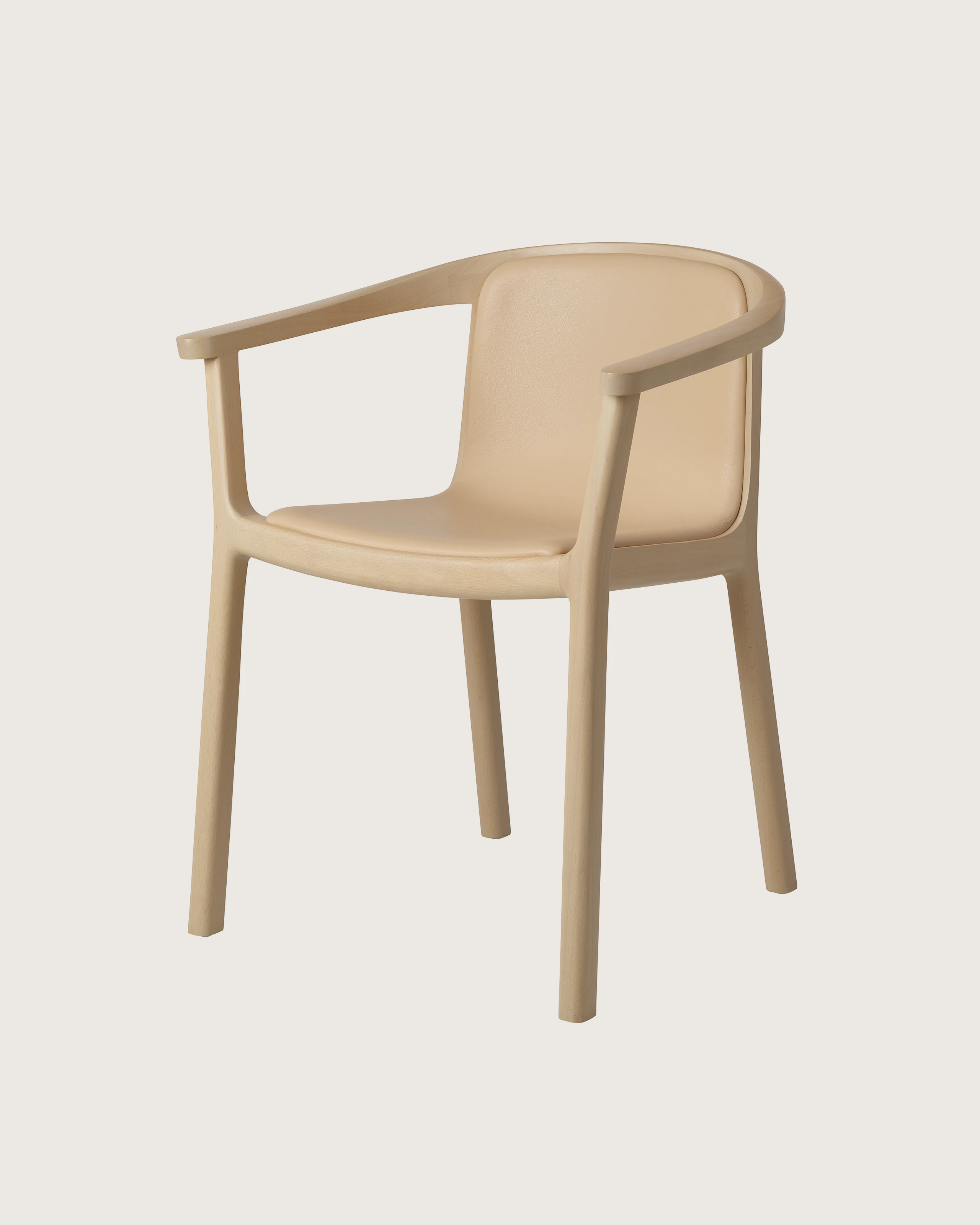 Lijn Armchair by Carole Baijings for Geiger in Light Beech frame upholstered with Maharam Prone Leather in Balsa, angled front view on a white sweep.