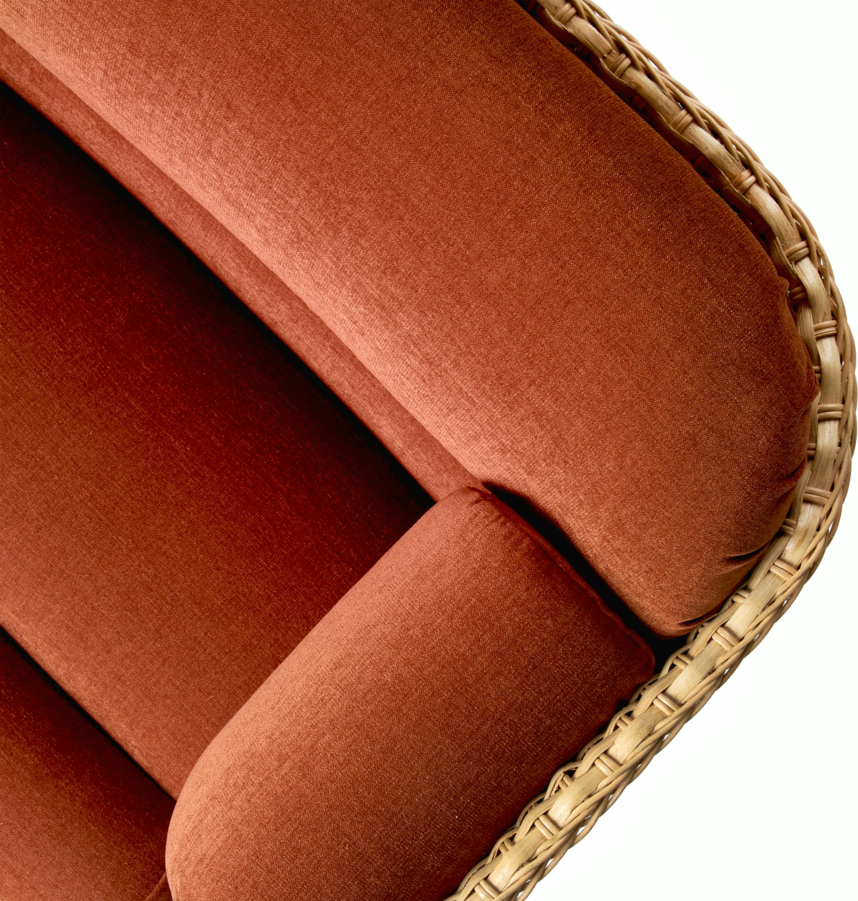 A detailed look at Basket Lounge Chair in Rust, Rattan.