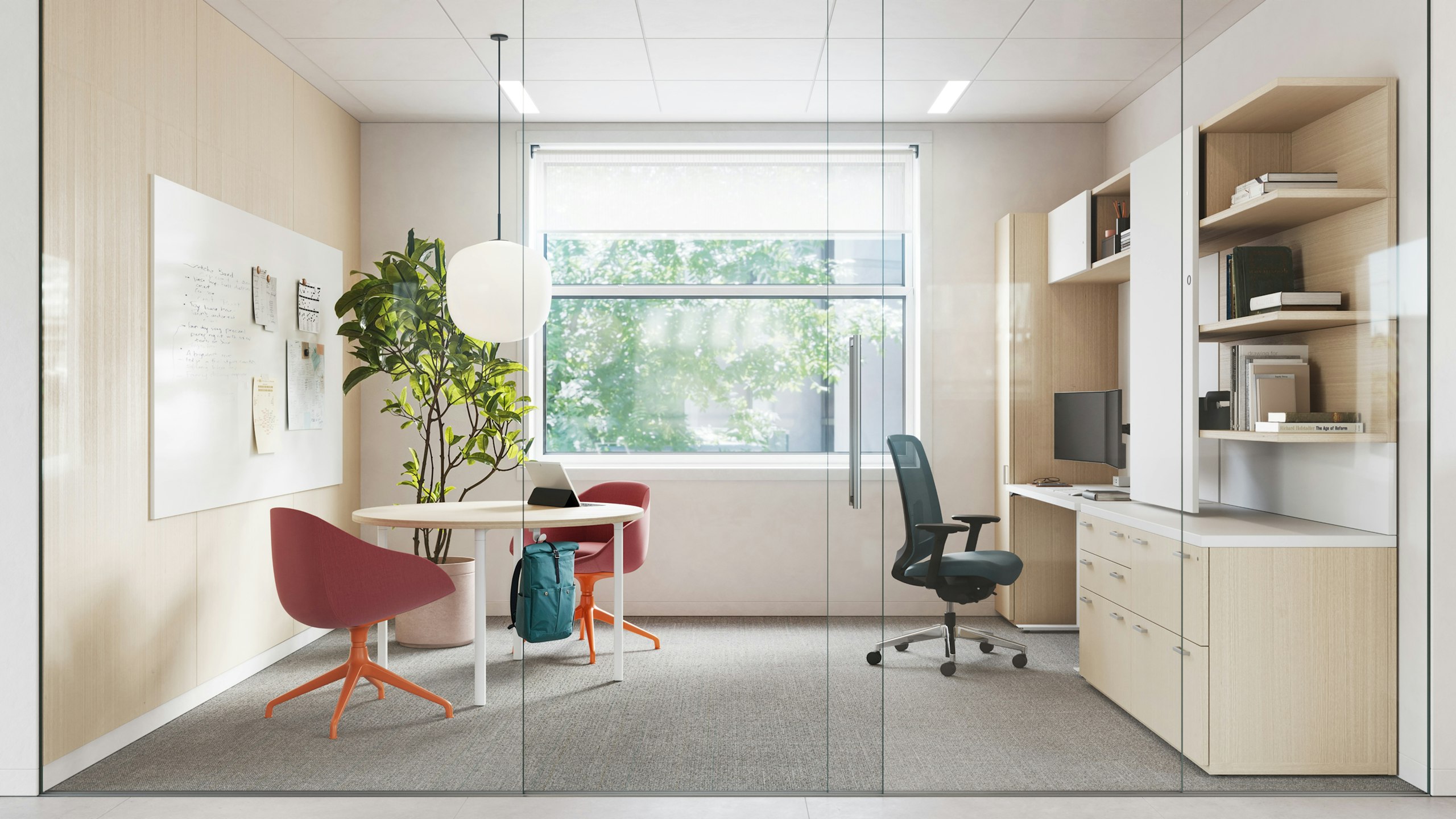 Faculty office furnished with two red-orange NaughtOne Always chairs, a Herman Miller Everywhere table and Verus chair, and Knoll Reff Private Office system.
