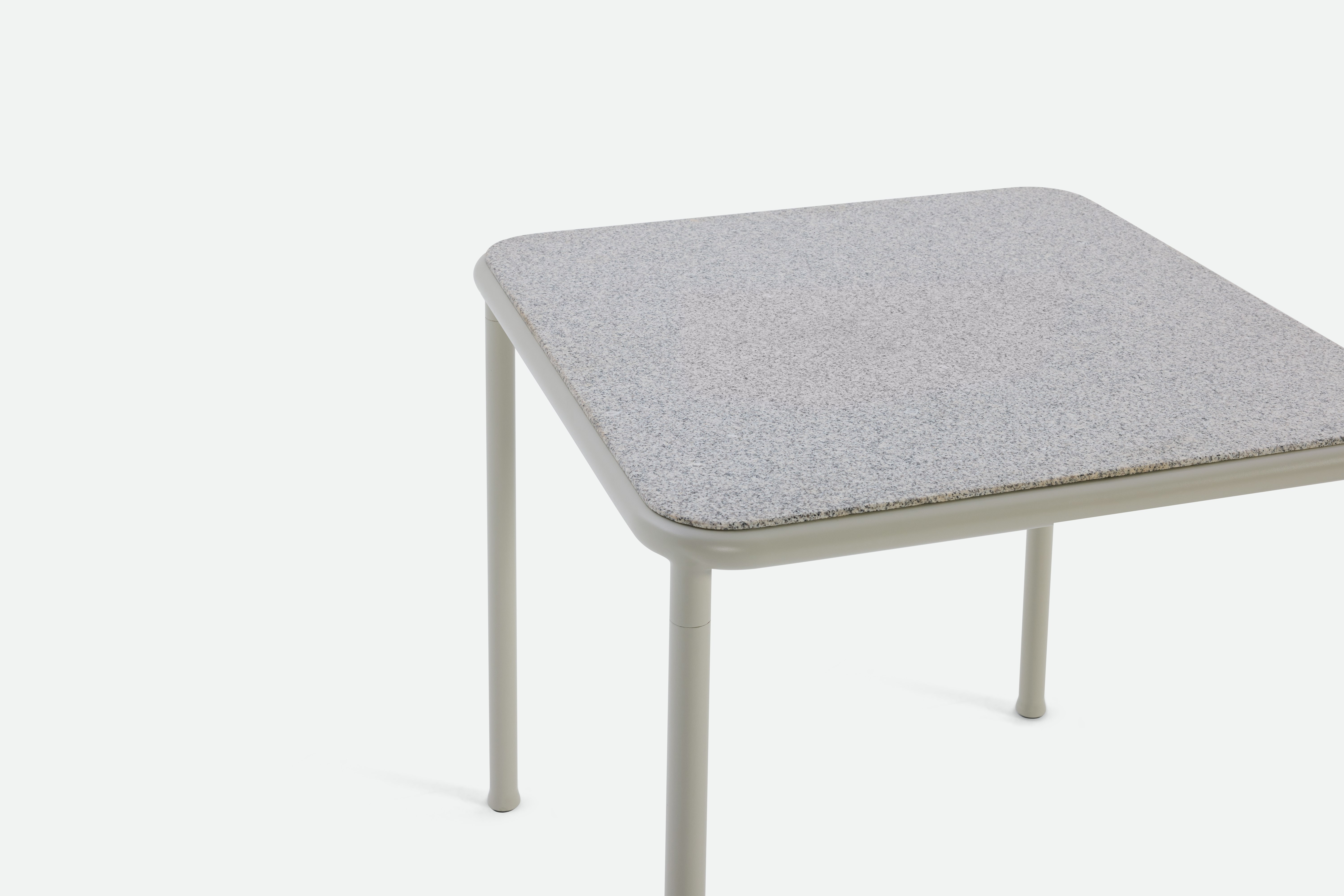 A detailed look at a Campus Outdoor Dining Table in Pebble Grey.