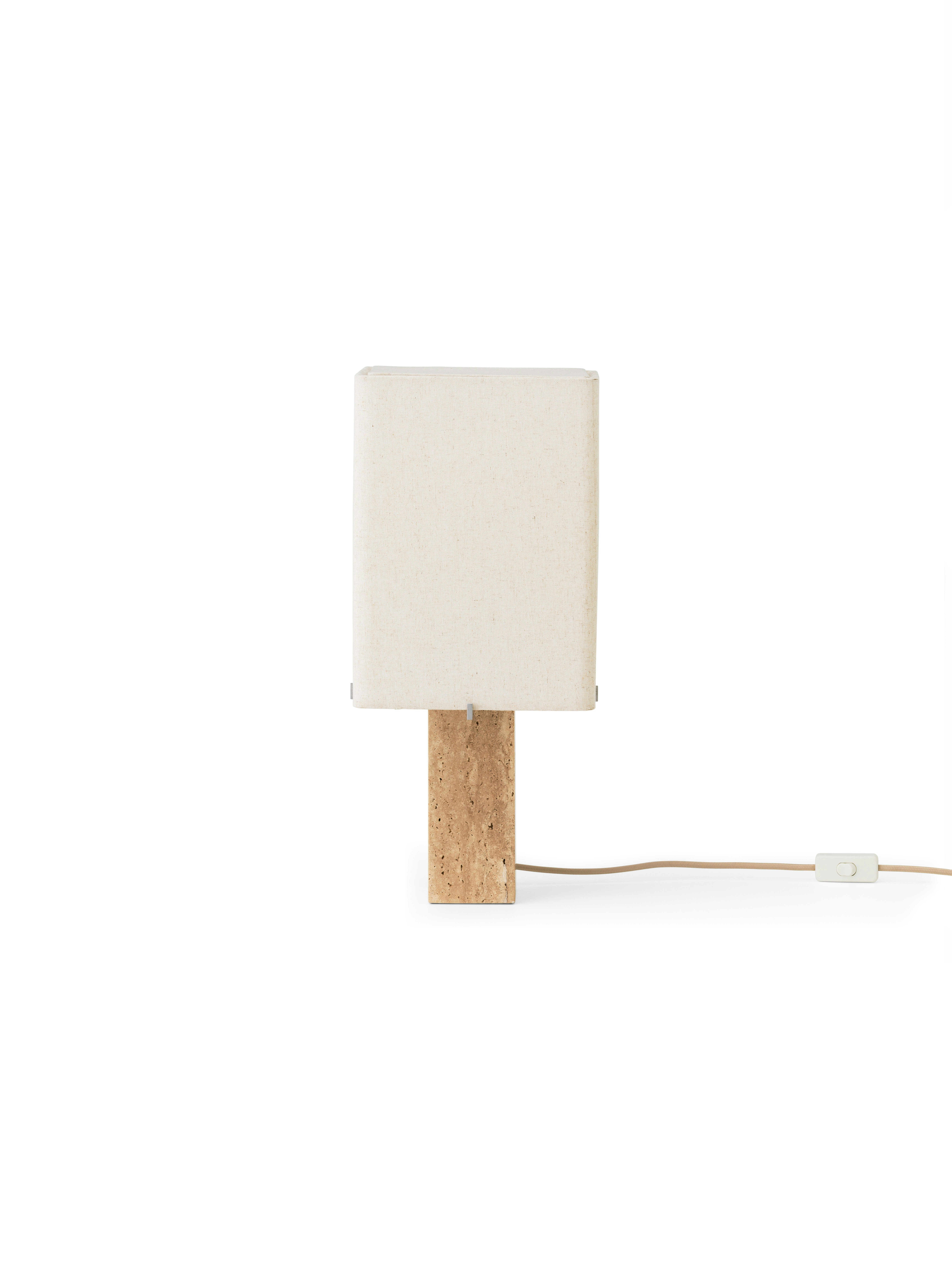 A Nonna Travertine Table Lamp  viewed from the front.