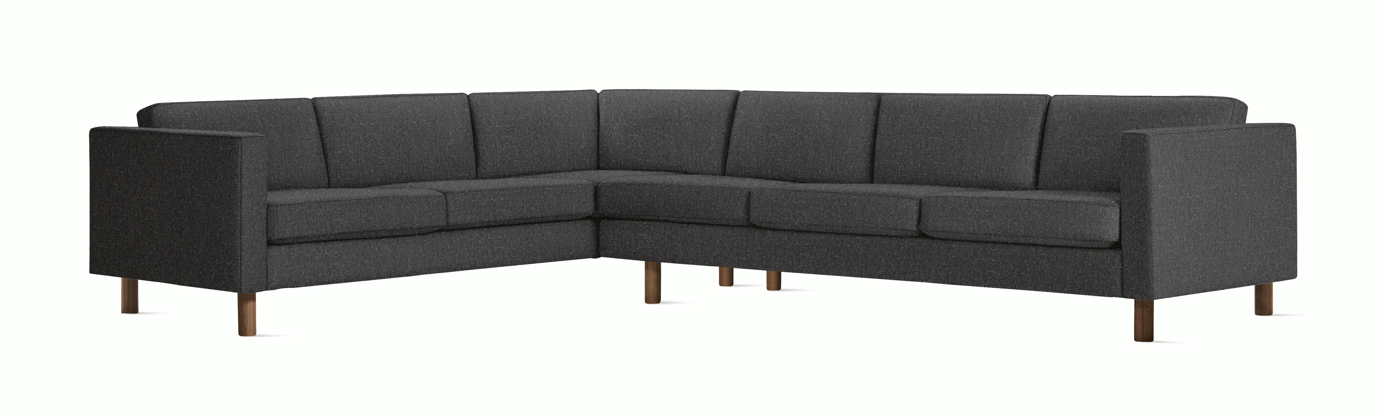 A Lispenard Corner Sectional in Millennium with Walnut finish viewed from the front.