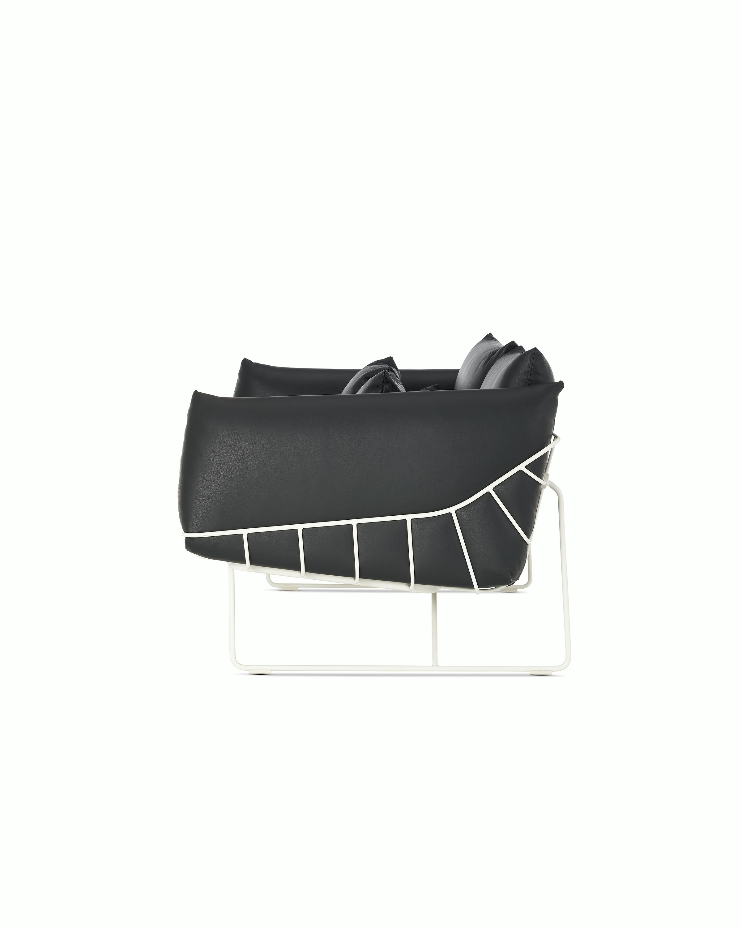 Wireframe Sofa Two Seater with black leather cushions and white frame. 