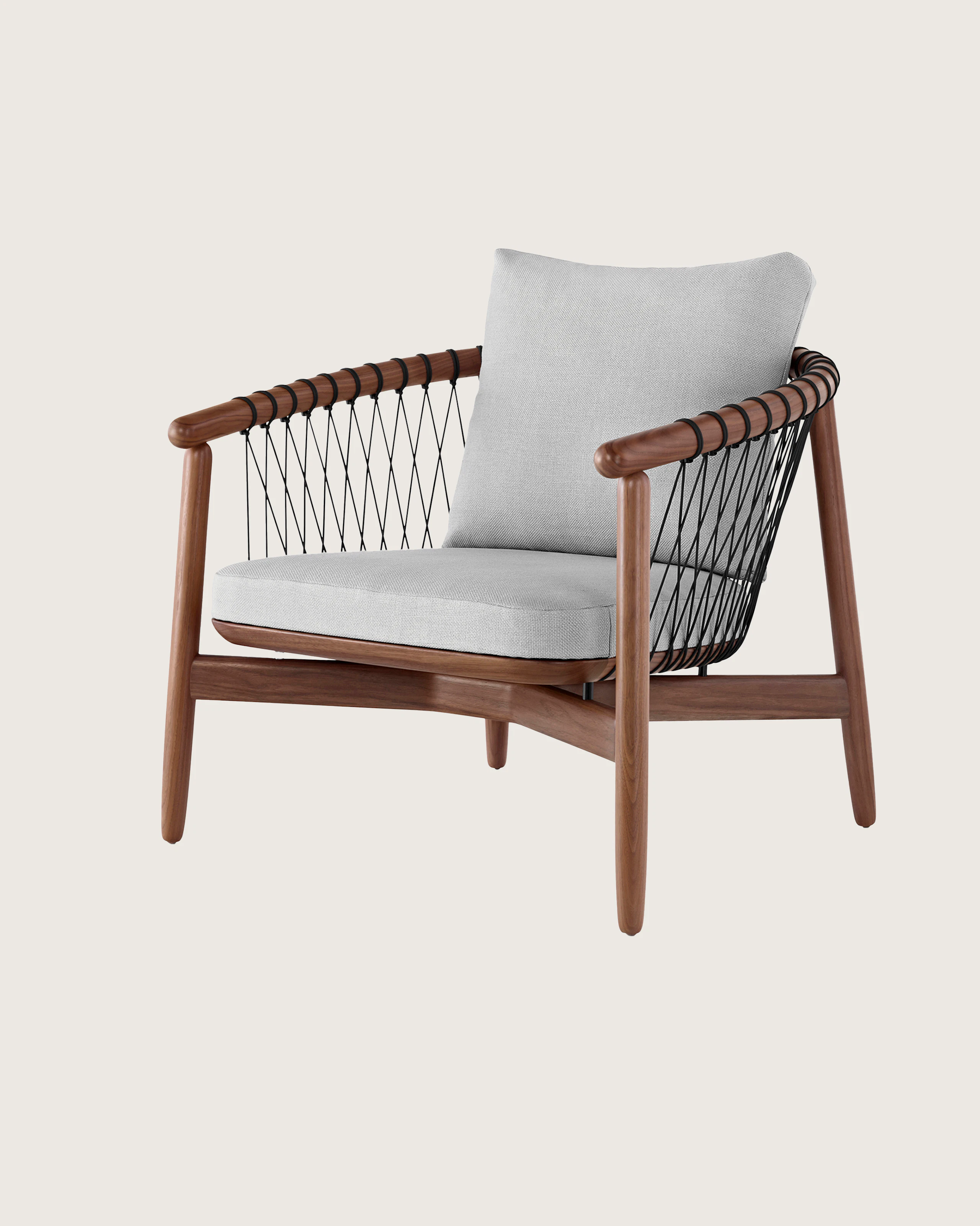 Angled view of a Crosshatch lounge chair with light gray fabric and a wood frame in a medium finish.