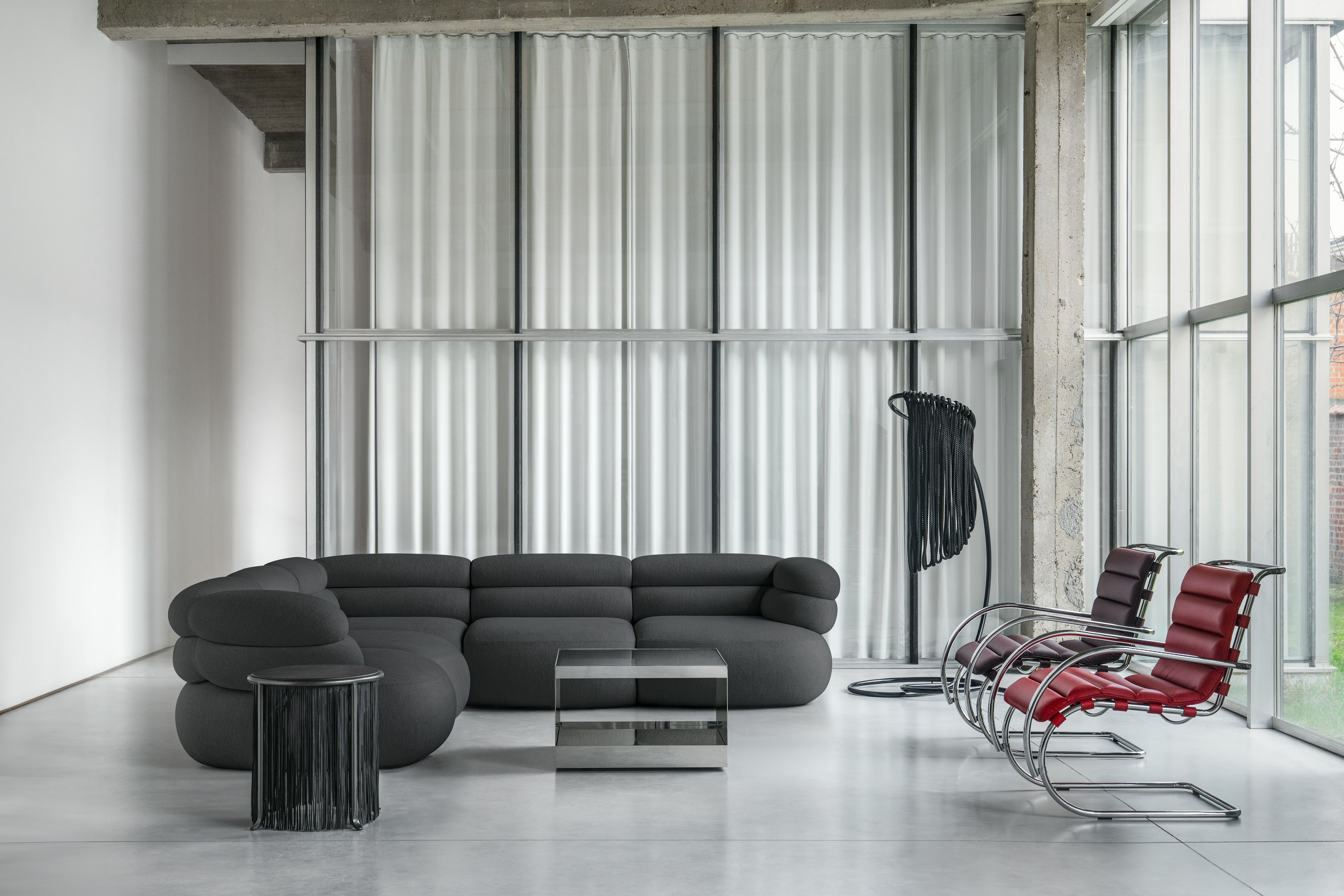 Biboni Sofa. MR Armchairs and D'Urso Table