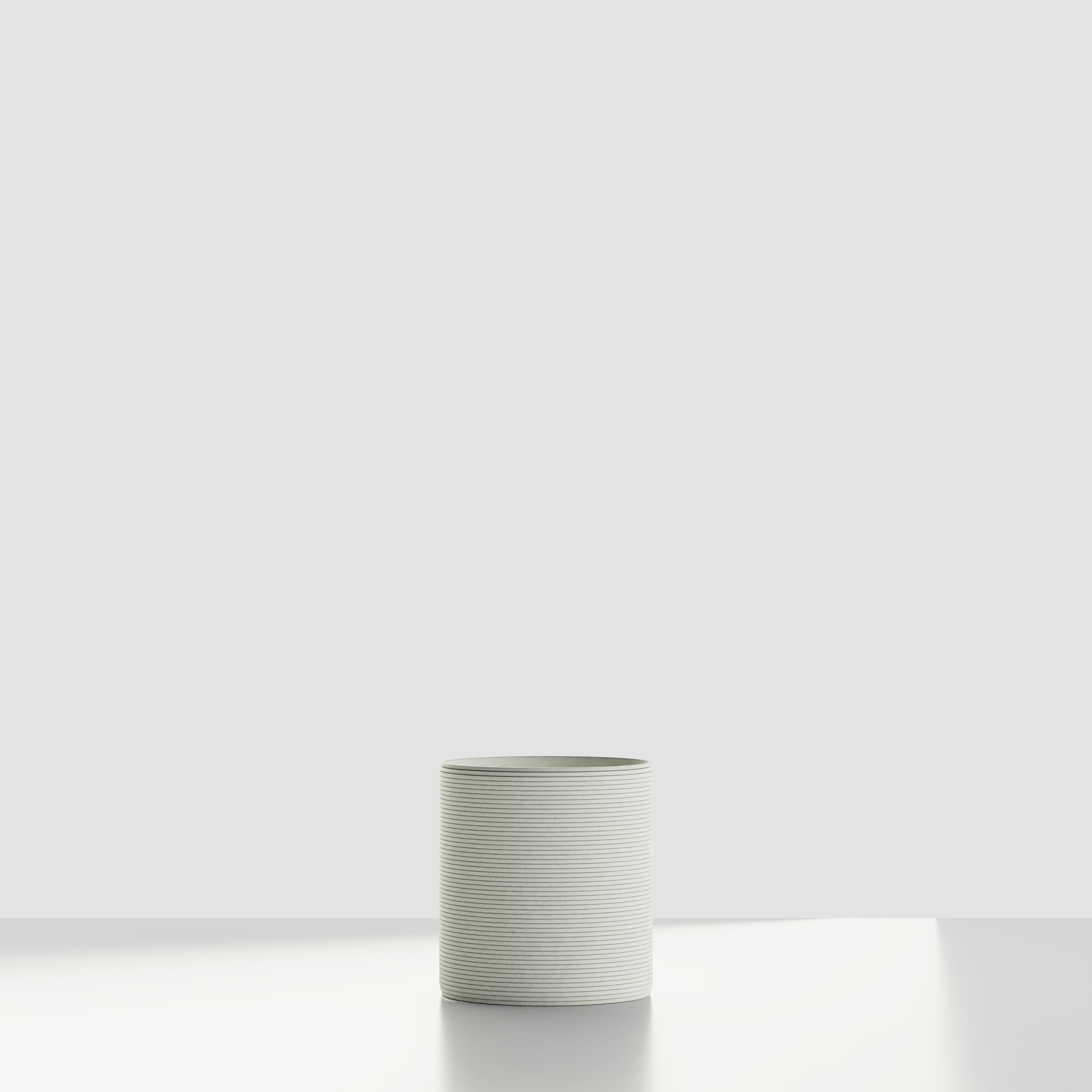 A Solana 3D Printed Concrete Planter in Glacial Mist Viewed from the front.