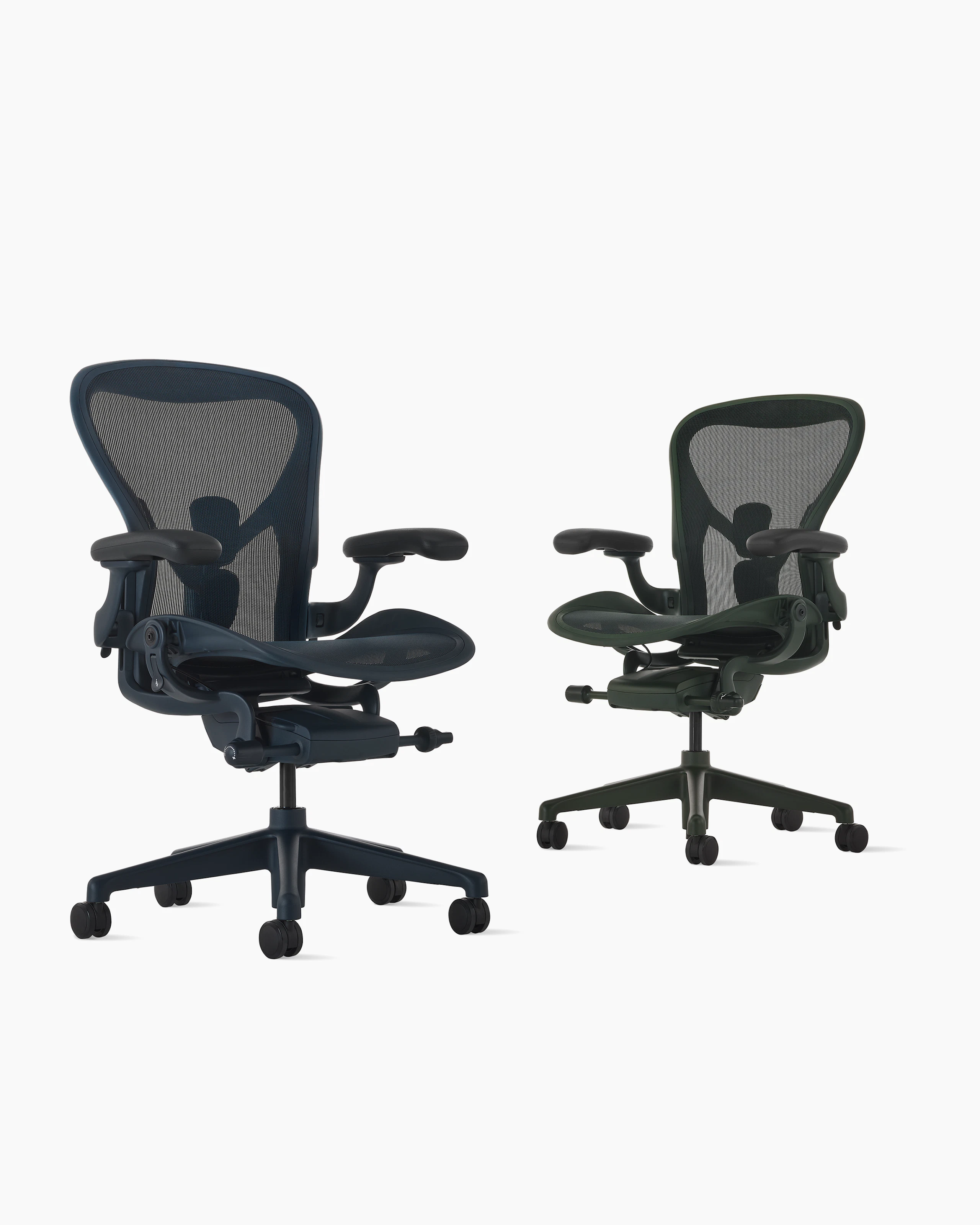 Aeron chairs in dark green and navy beside each other.