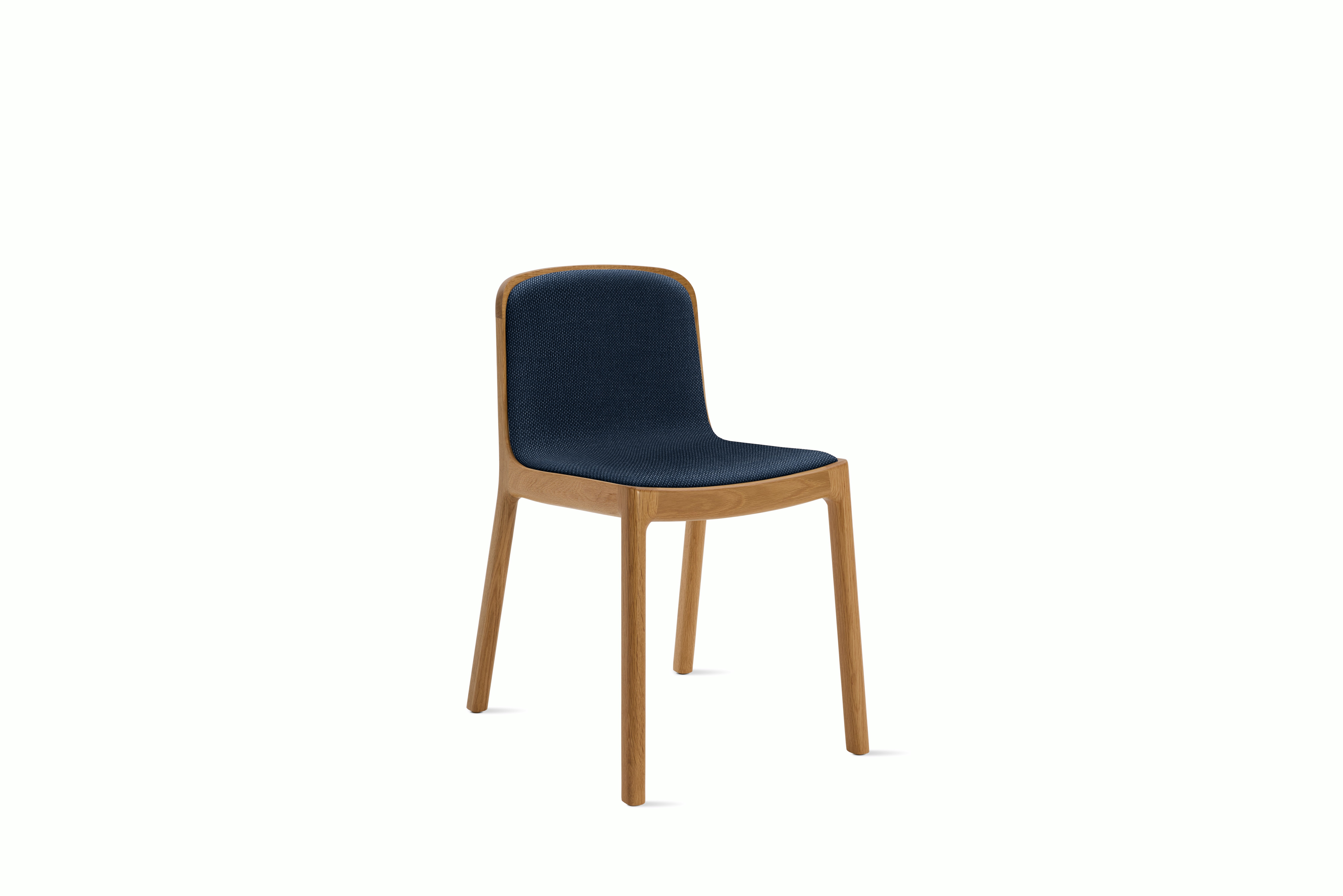 A Lijn Side Chair in Society Oak viewed from an angle.