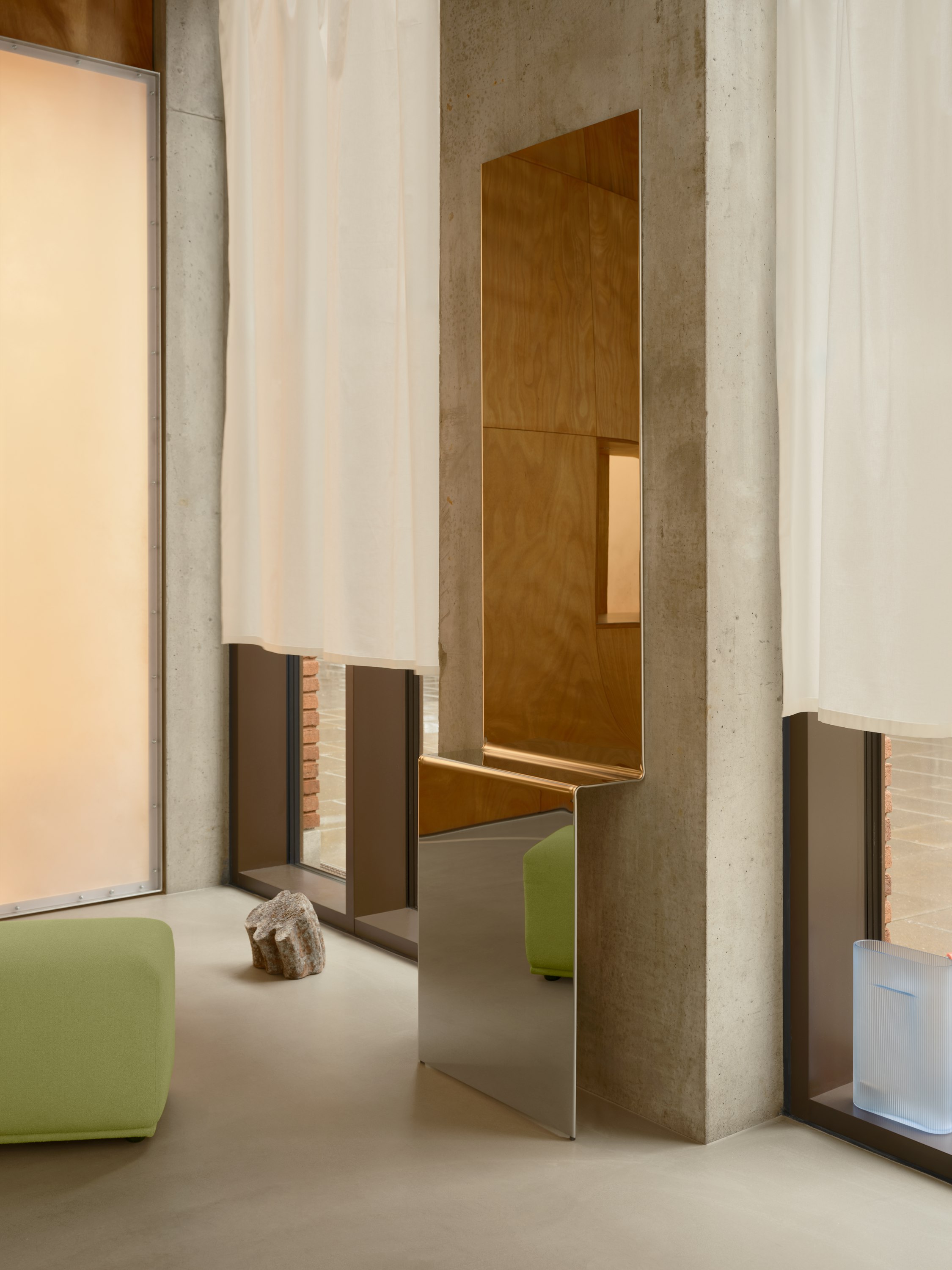 Pleat Mirror in Polished Steel - Echo Pouf in Acca 961 - Ridge Vase H35 in Light Blue Frosted Glass