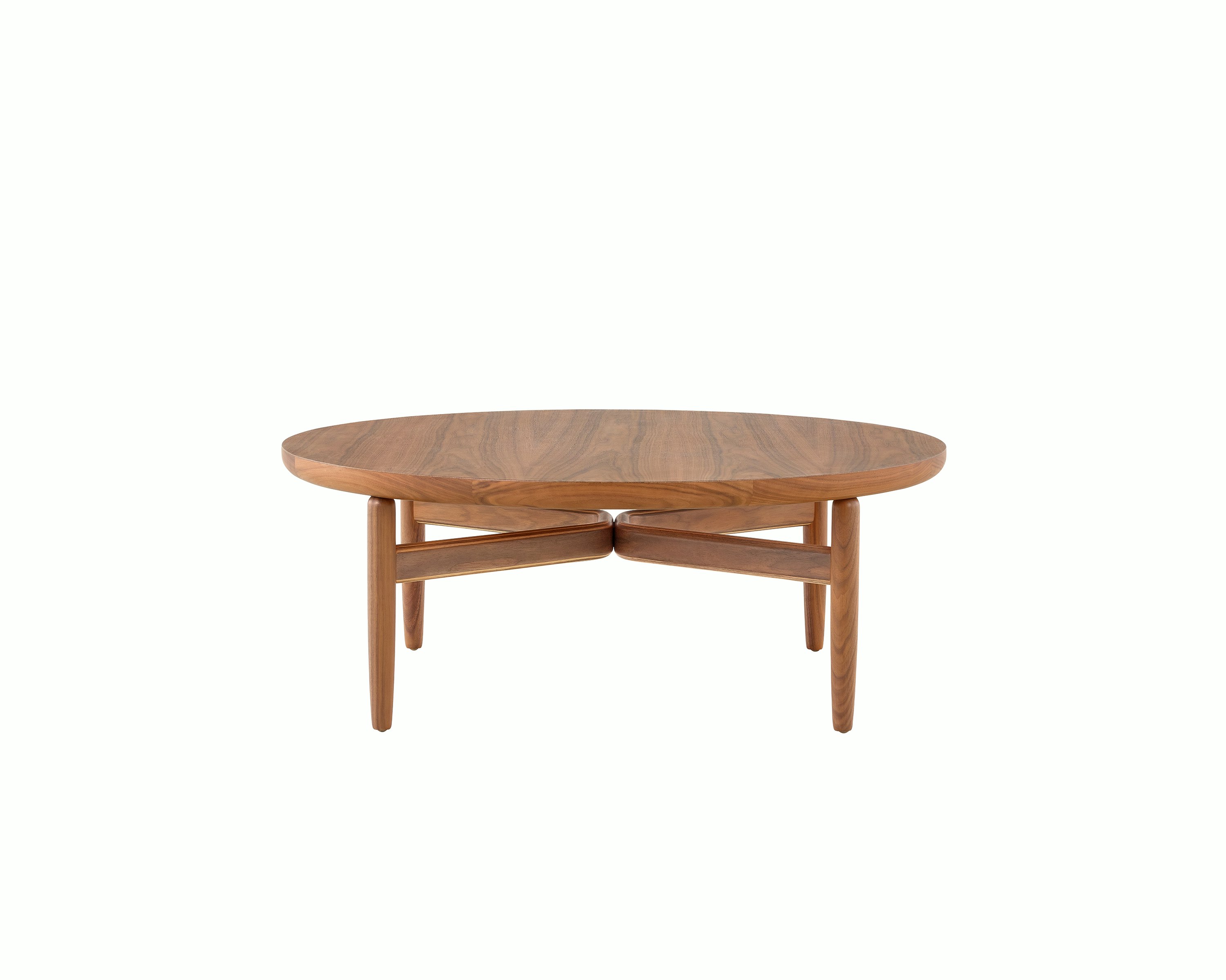 A Reframe Round Table in Walnut, viewed from the side.