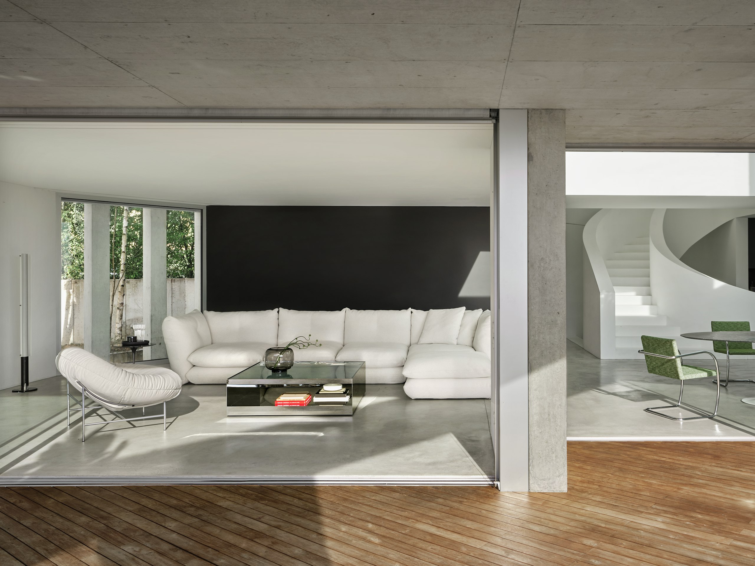 Bun Lounge Chair, D'Urso Coffee Table in Stainless and Pillo Sofa and Ottoman