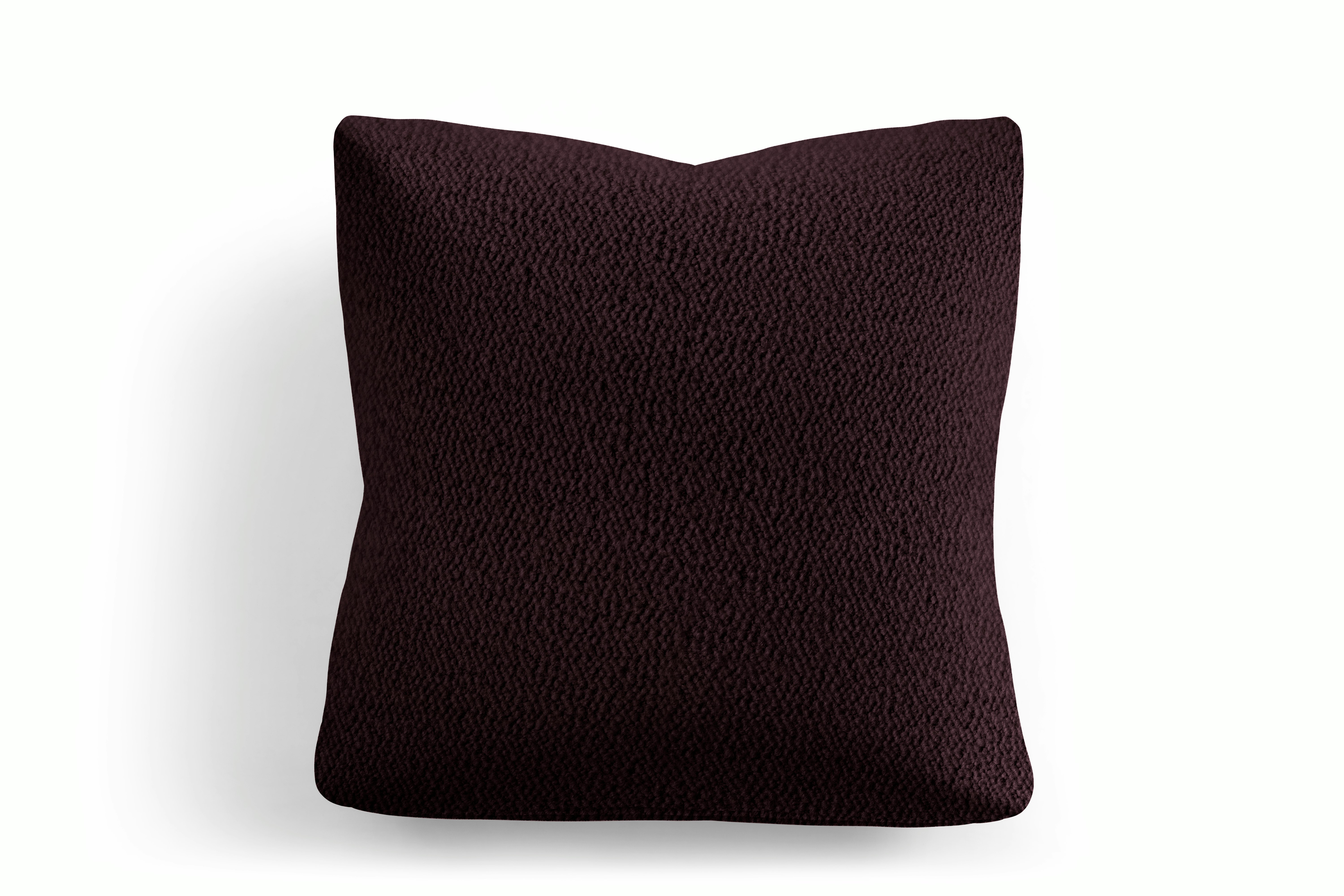 A Irvin Throw Pillow in Burgundy Viewed from the front.