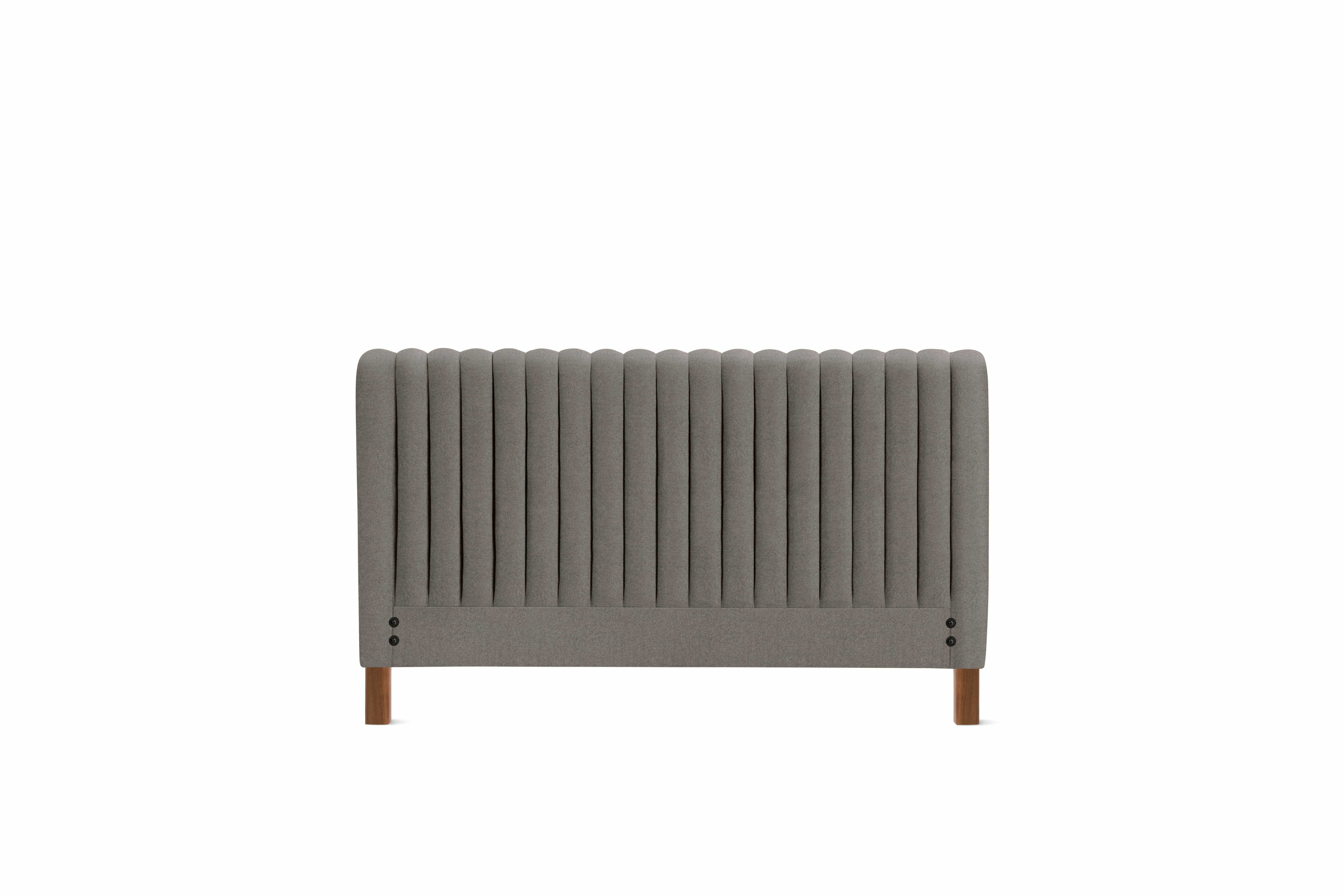 A Charlotte Headboard in Plutonic viewed from an angle.