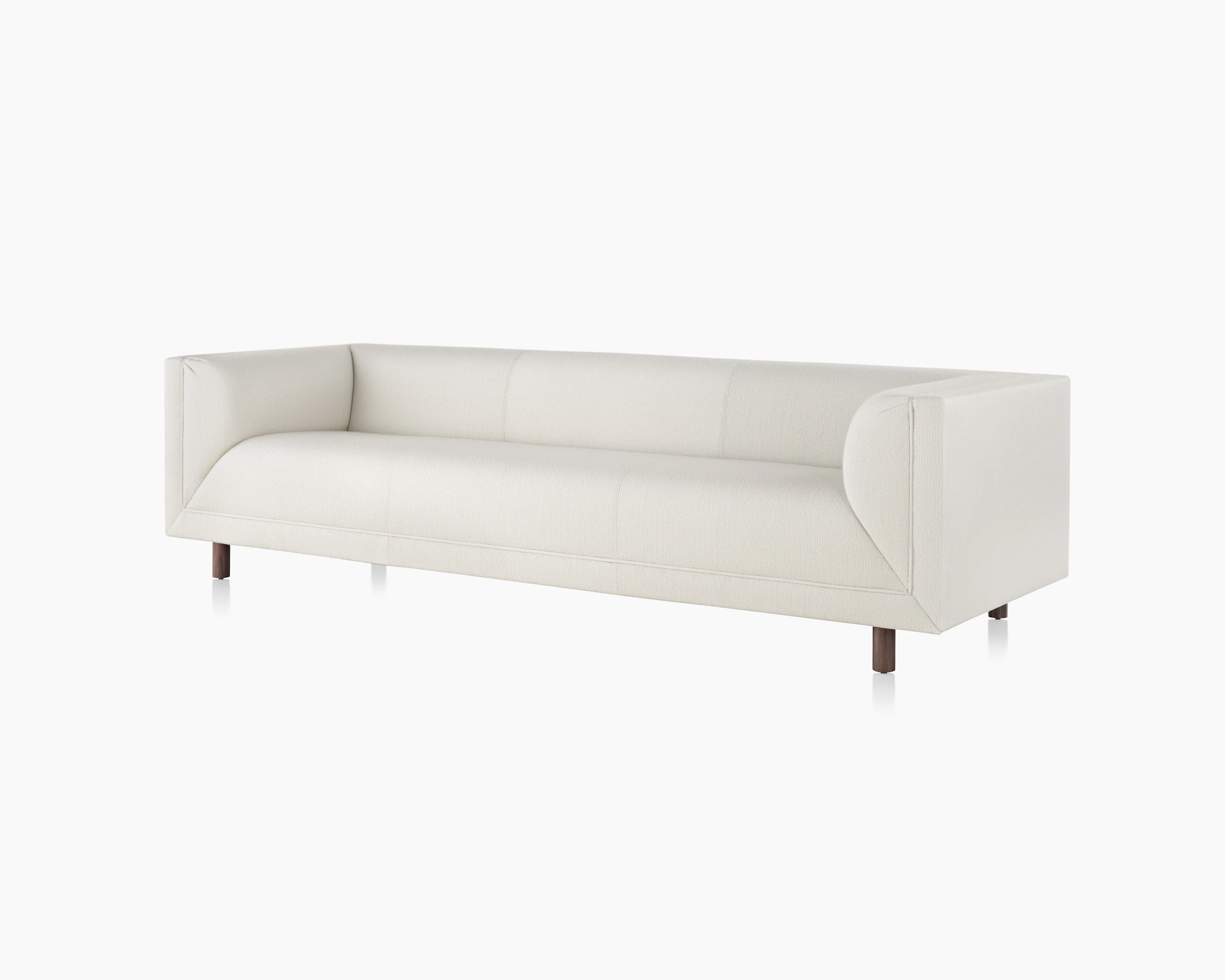 Angled view of an off-white sofa from the Rolled Arm Sofa Group.
