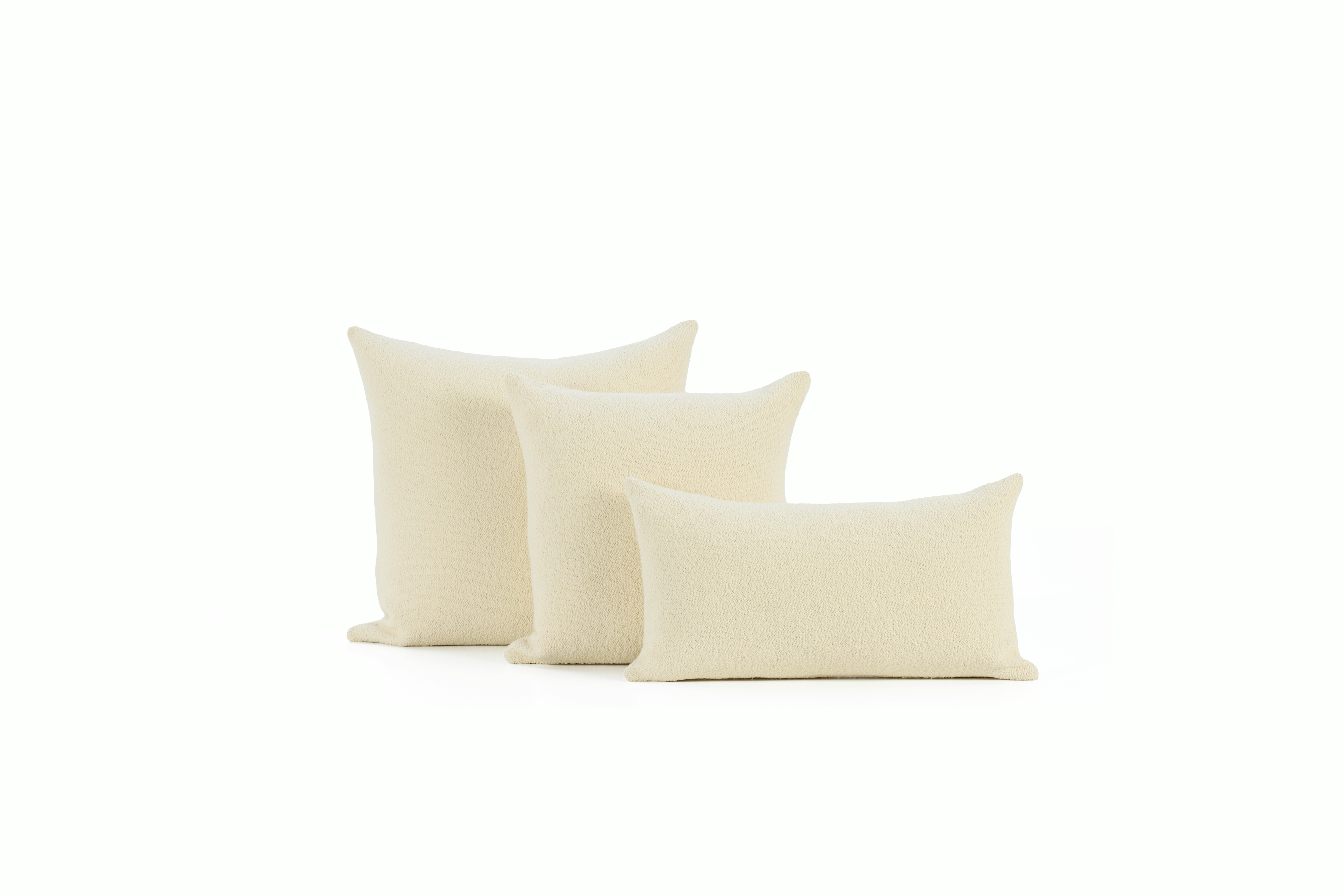 A detailed look at a Turf Boucle Pillow in Cream Family.