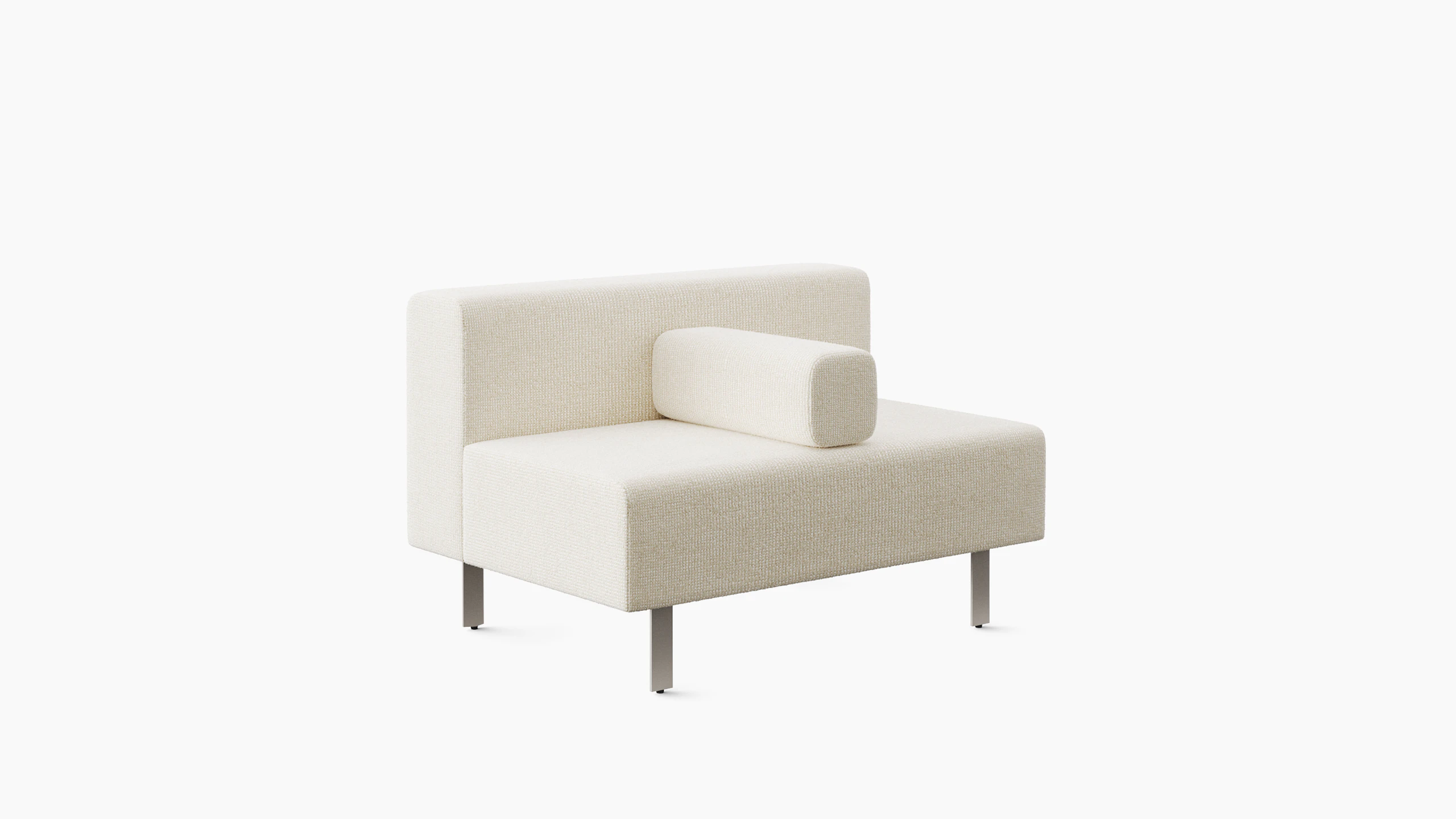 A light colored lounge seat is shown from an angle. There is a rectangular pillow on the seat that matches the bench.