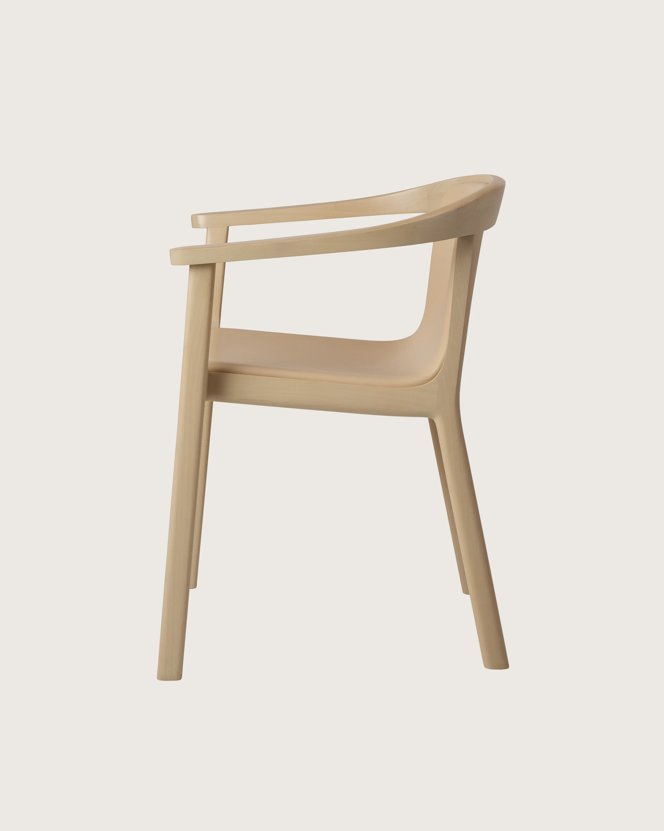 Lijn Armchair by Carole Baijings for Geiger in Light Beech frame upholstered with Maharam Prone Leather in Balsa, side view on a white sweep.