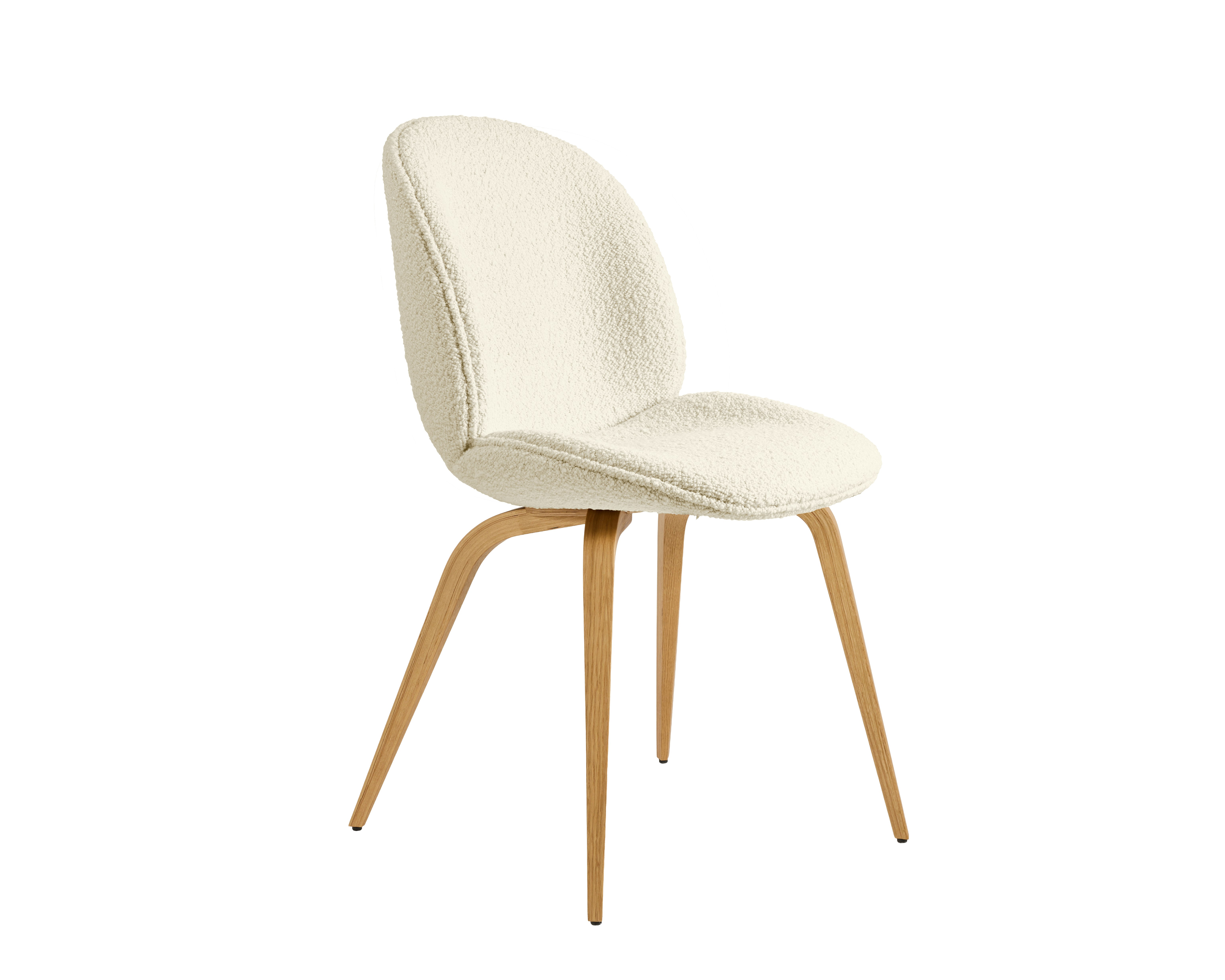 A Beetle Side Chair in cream, oak viewed from an angle.
