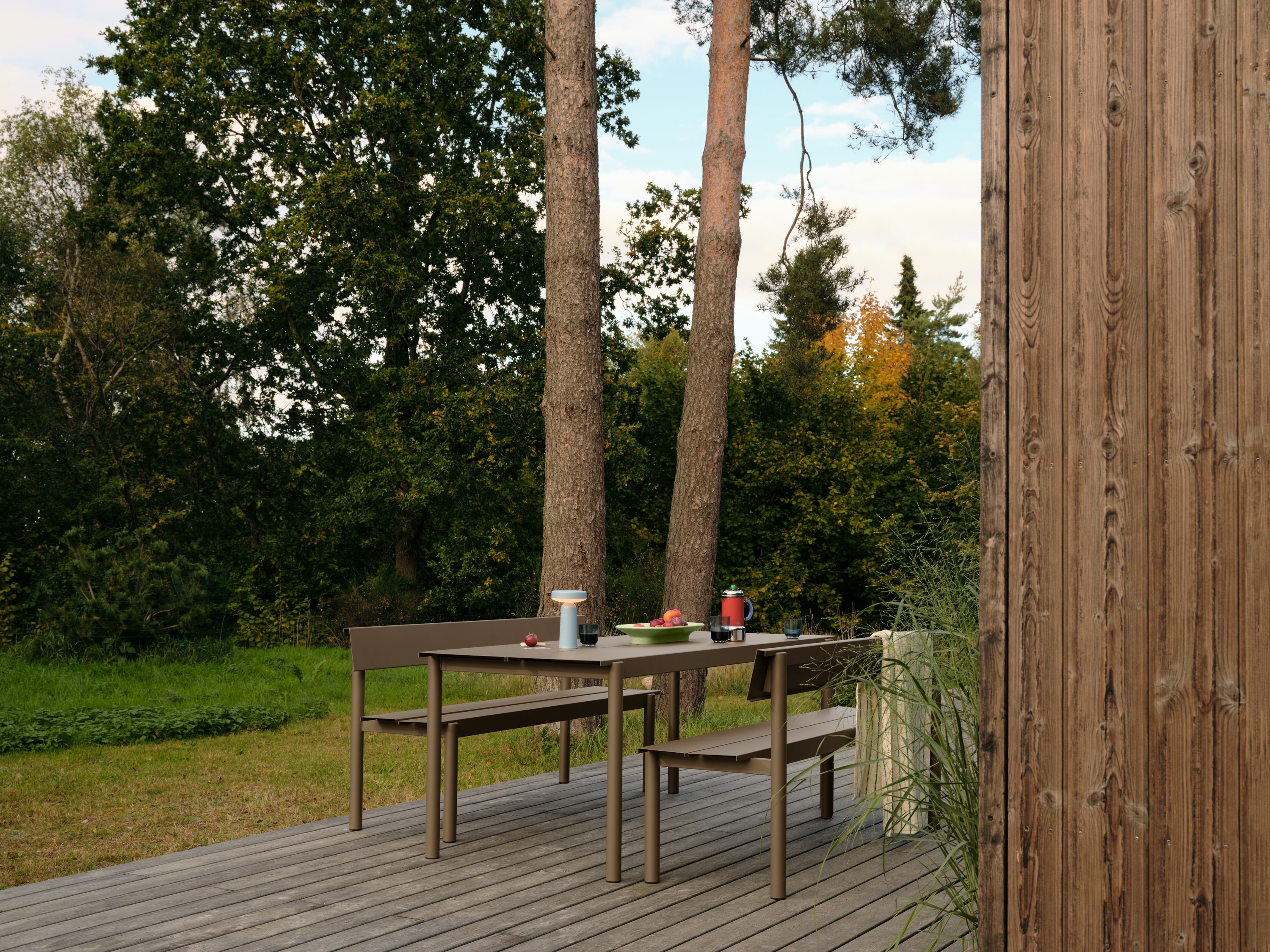  Linear Steel Bench 170 cm w. Backrest in Taupe - Linear Steel Table 200 cm in Taupe - Ease Portable Lamp in Light Blue - Mere Bowl in Light Green - Raise Glasses in Dark Blue