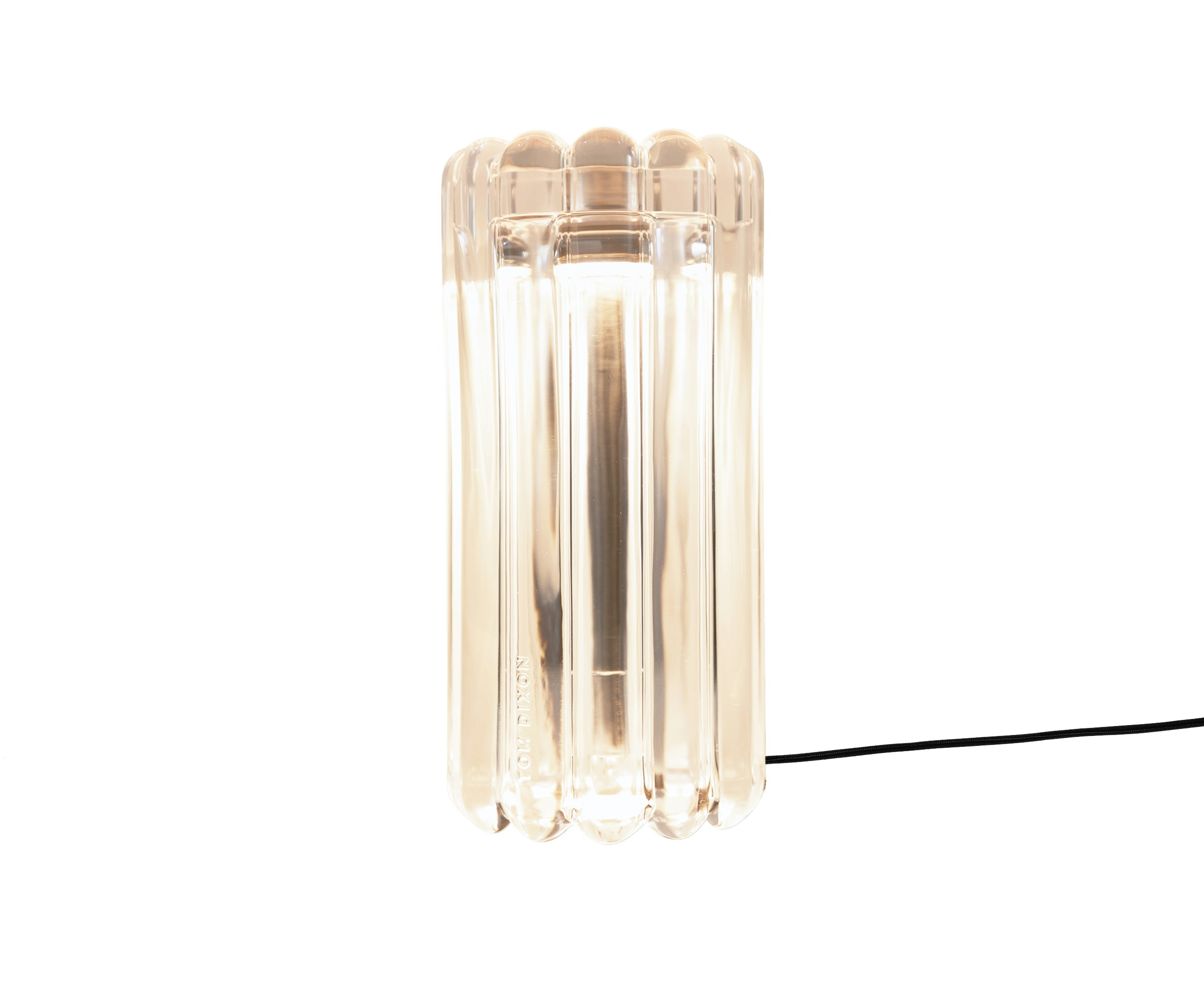 A Press Table Lamp in Clear Glass viewed from the front.