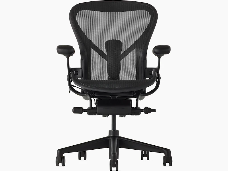 Black matte Aeron Chair on a white background with a 5-star base and ergonomic back support, viewed from the front.