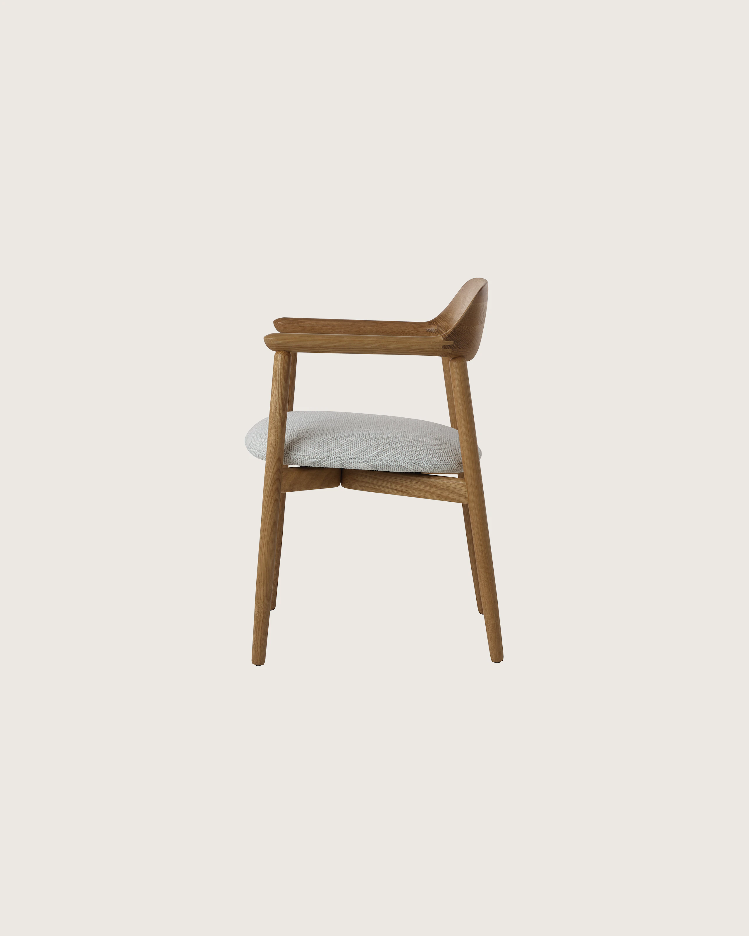 Crosshatch Side Chair by EOOS for Geiger in Natural Oak with Capri in Show upholstery, side view on a white sweep.
