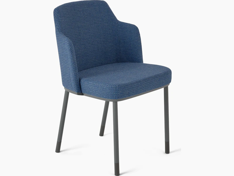 Medium blue Remix Side Chair with small built in arm rests. Upholstered in a Dapper textile in the color Songbird (blue). Medium grey frame that includes four legs on glides. White background.
