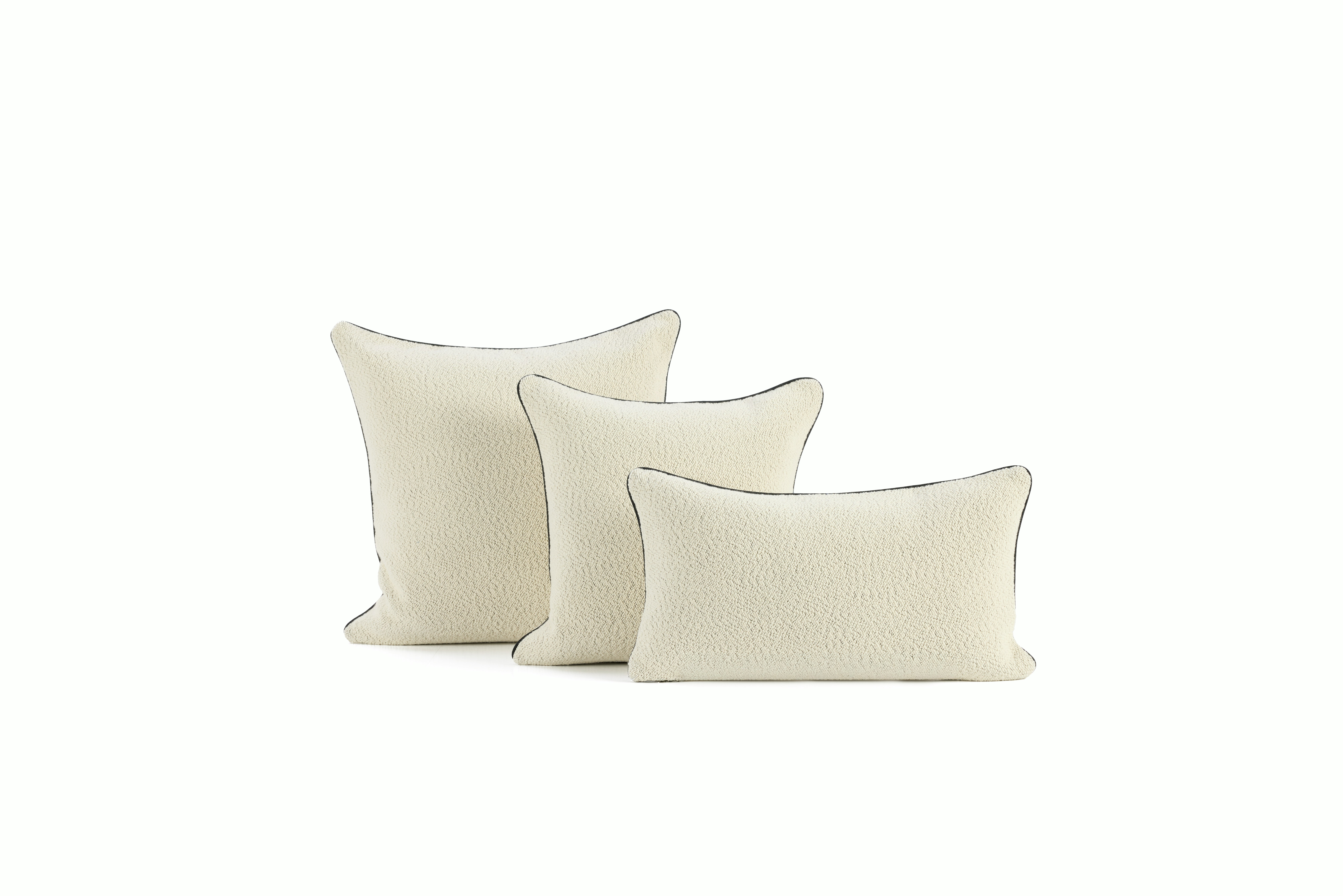 A detailed look at a Turf Color Blocked Pillow in Cream Melange Cream Family.