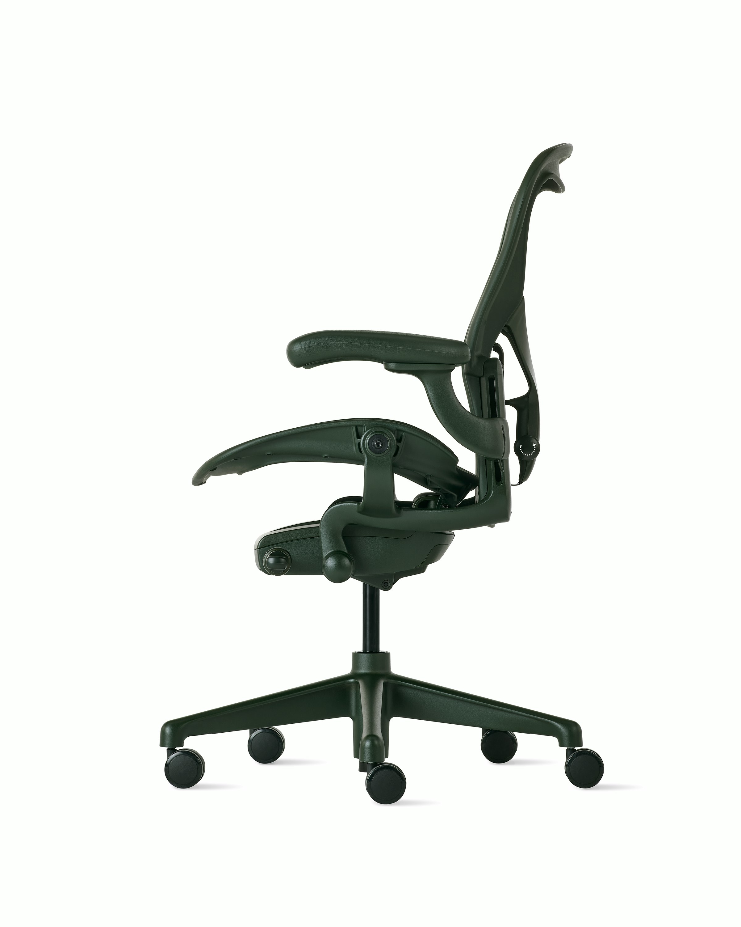 Side view of an Aeron chair in dark green with PostureFit SL.
