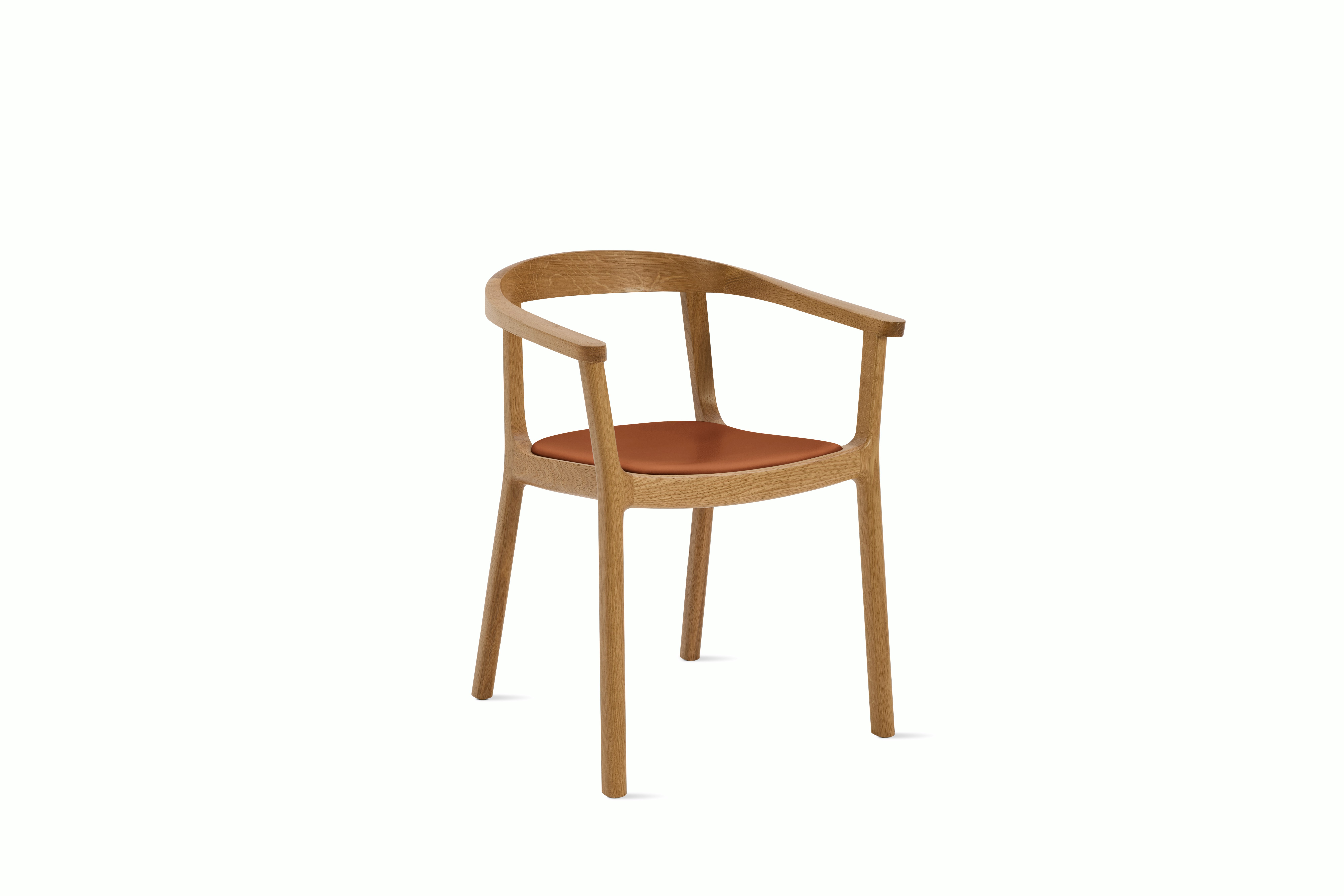 A Lijn Armchair in Ledge Oak viewed from an angle.