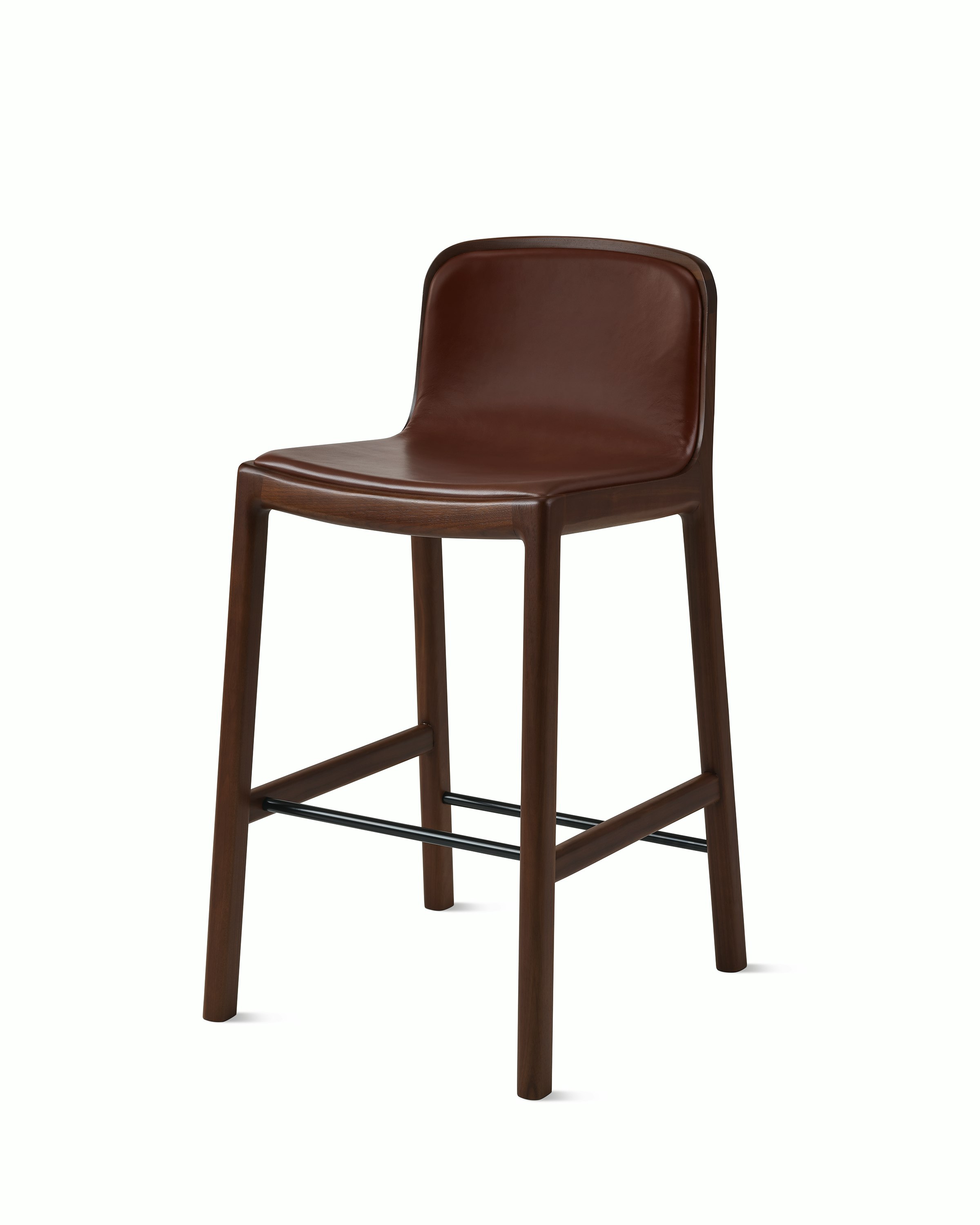 Lijn Stool by Carole Baijings for Geiger in Persian Walnut frame upholstered with Maharam Hue Leather in Bittersweet, angled front view on a white sweep.