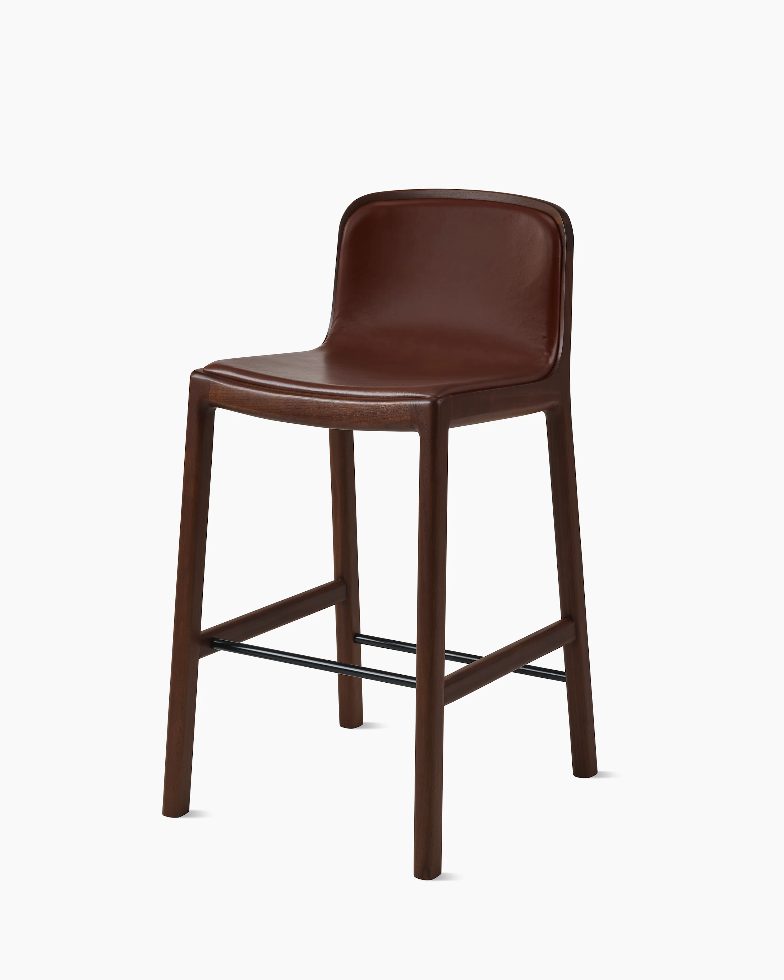 Lijn Stool by Carole Baijings for Geiger in Persian Walnut frame upholstered with Maharam Hue Leather in Bittersweet, angled front view on a white sweep.