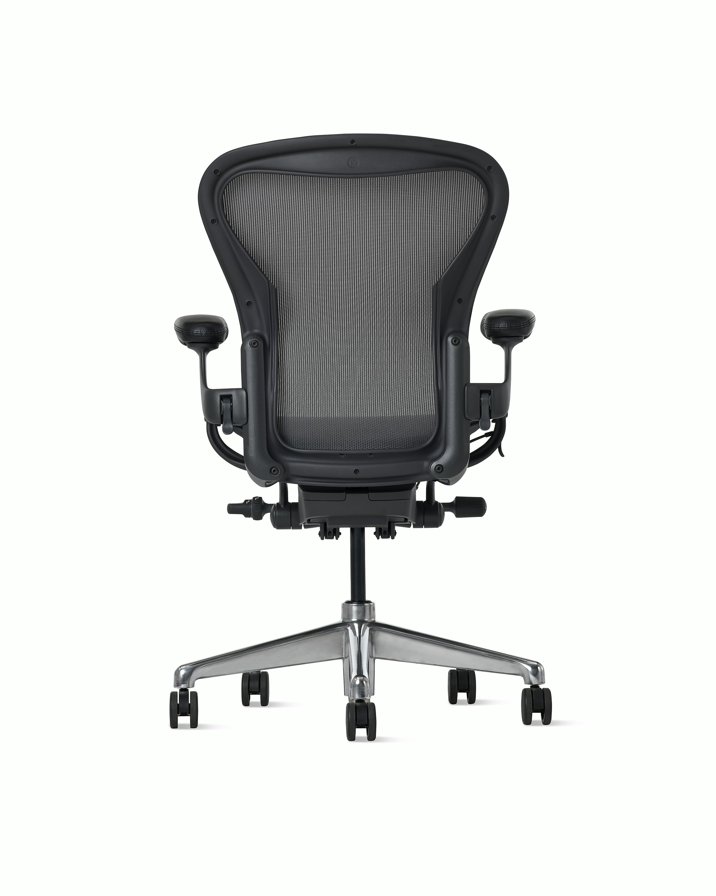 Rear view of an Aeron ESD chair in size B, granite frame and suspension and polished base.