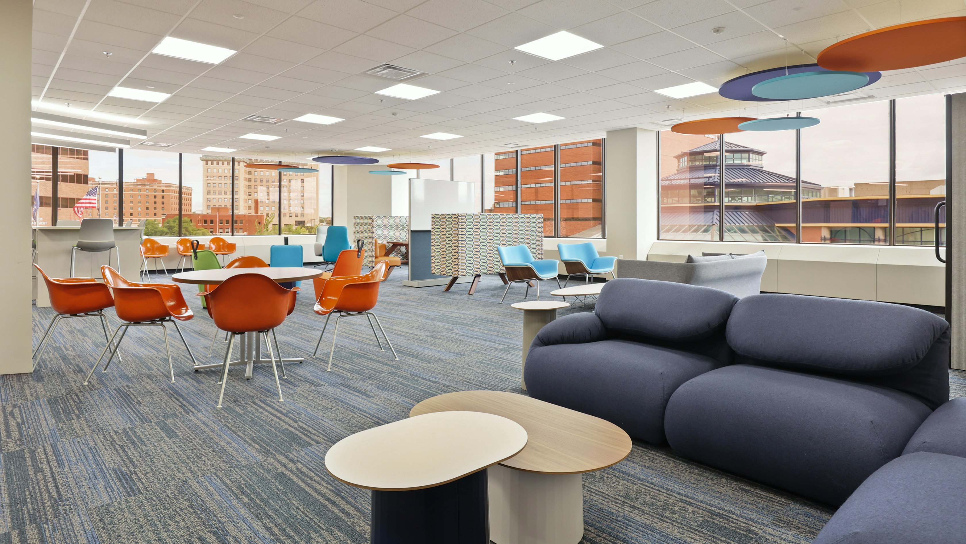 Large communal seating area furnished with pieces from the MillerKnoll Collective of brands at the Genesse County administration building in Michigan.