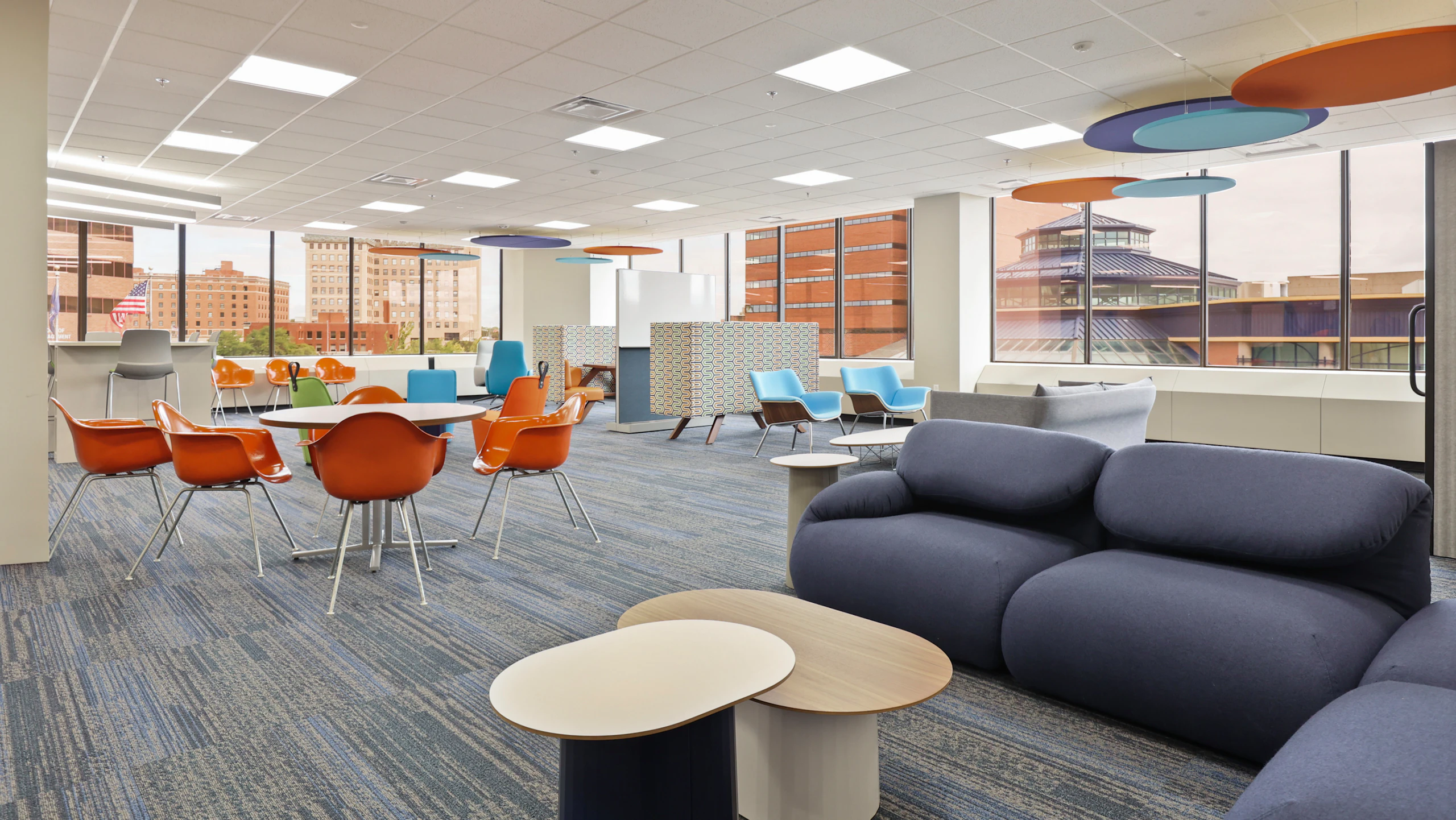 Large communal seating area furnished with pieces from the MillerKnoll Collective of brands at the Genesse County administration building in Michigan.
