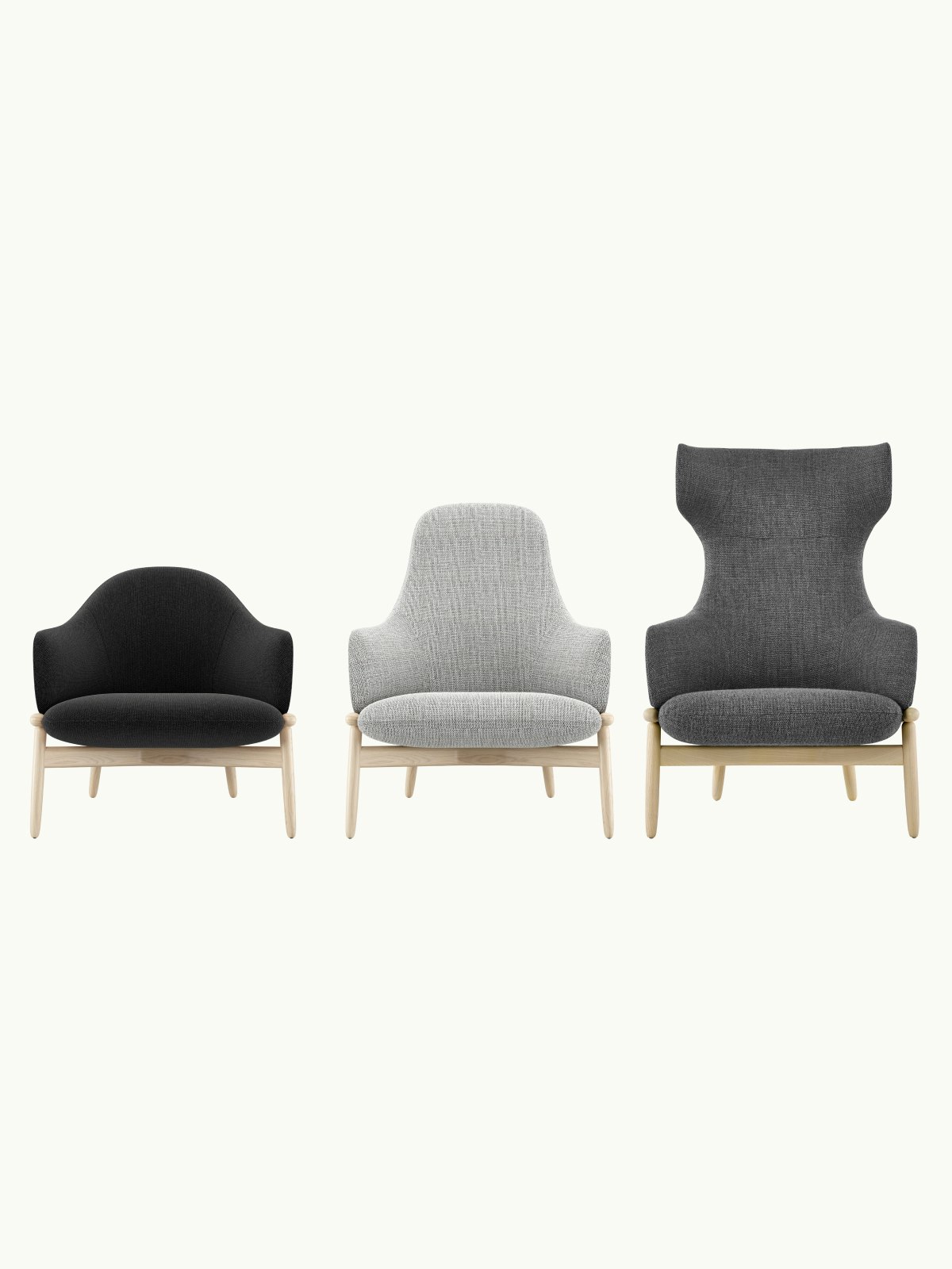 Three front-facing Reframe Lounge Chairs designed by EOOS with oak frames, one mid-back with black upholstery, one high-back with light grey upholstery, and one wing-back with dark grey upholstery, on a white sweep.