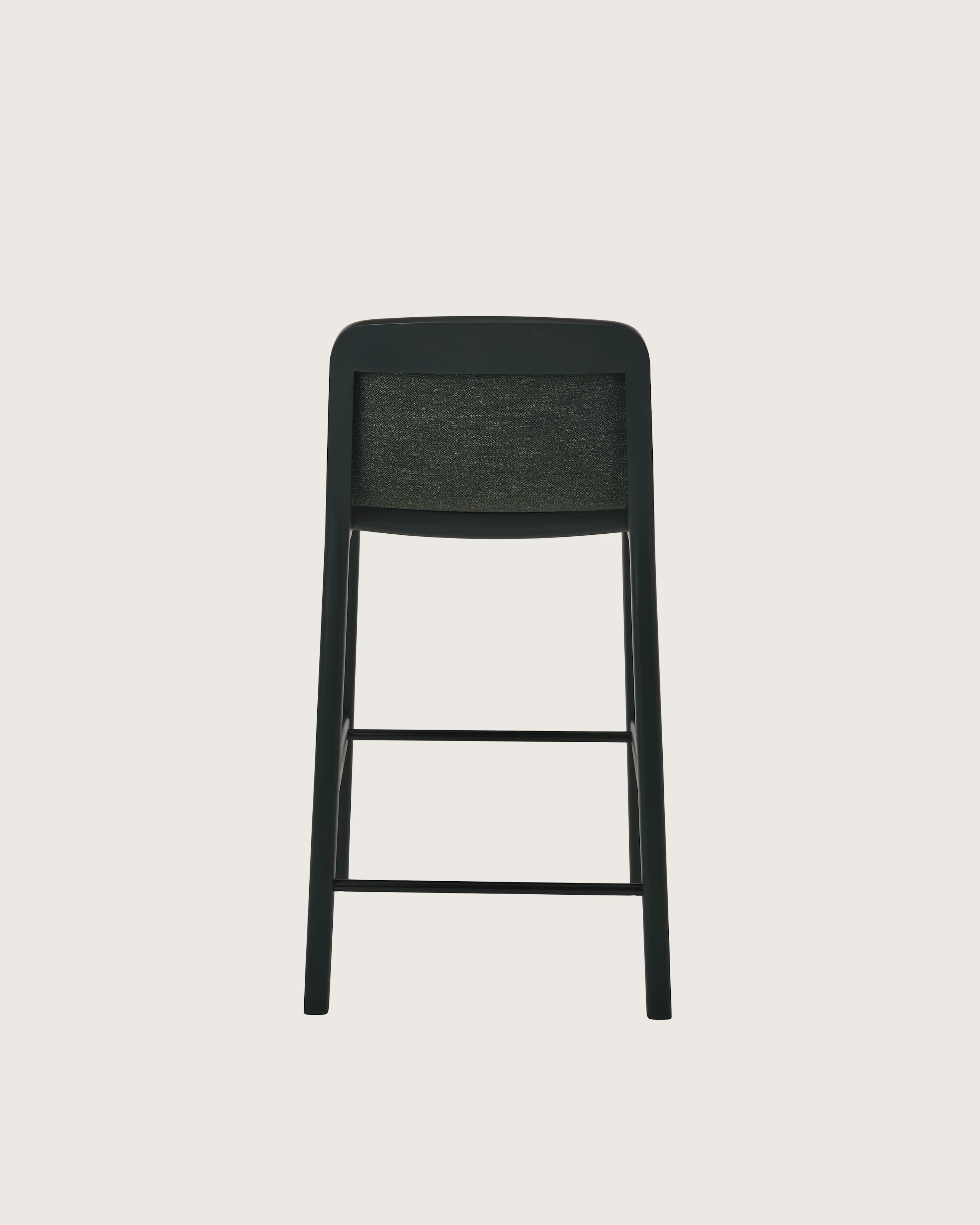 Lijn Stool by Carole Baijings for Geiger in Ivy frame upholstered with Bellano in Black Green, back view on a white sweep.