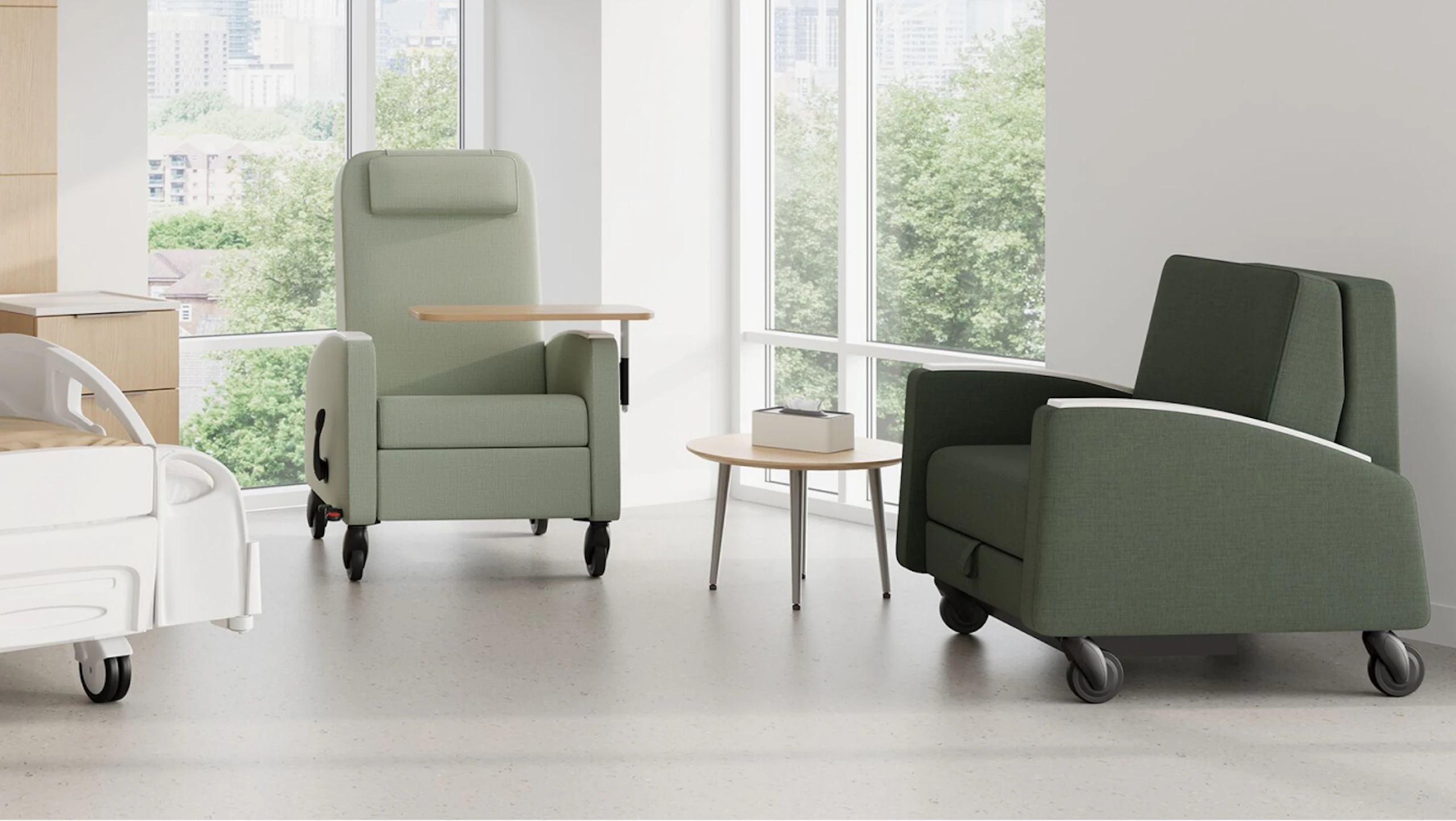Gemma Recliner, Gemma Sleep Chair and Mora System in a patient room. Featuring Gemma Recliner with adjustable tray table, and both Gemma products with CBS casters.