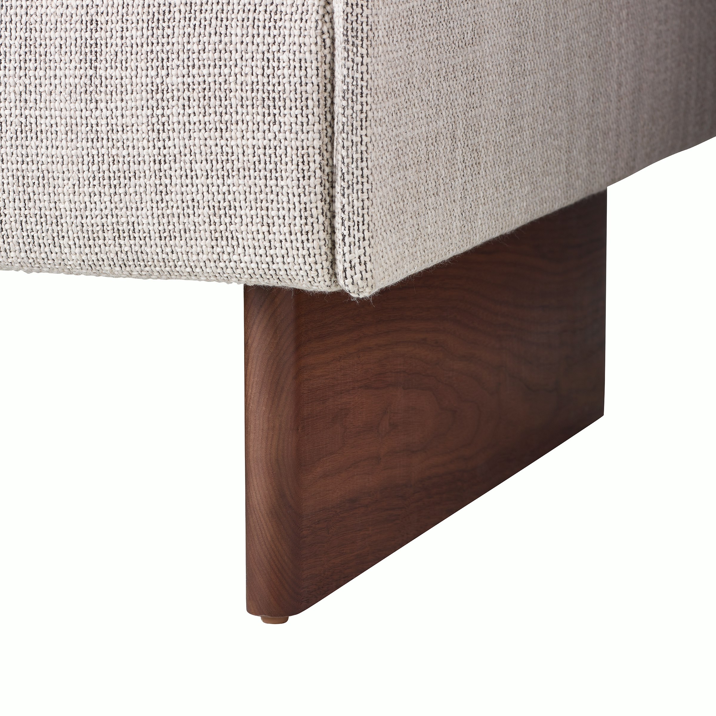 Mantle Lounge Seating in Capri Stone with Walnut Base, detail of base.