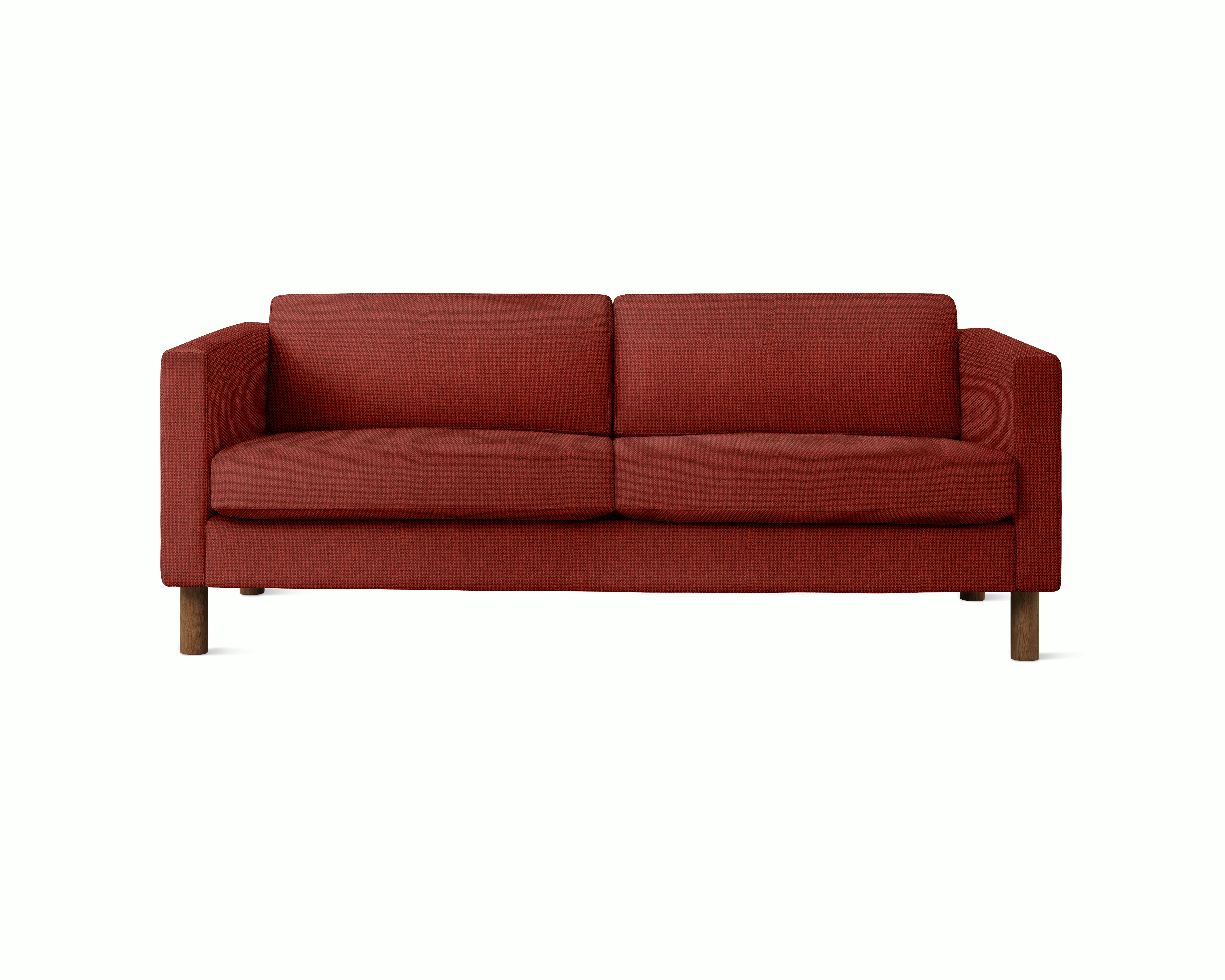 A Lispenard Sofa in Alder upholstery with walnut legs viewed from the front.
