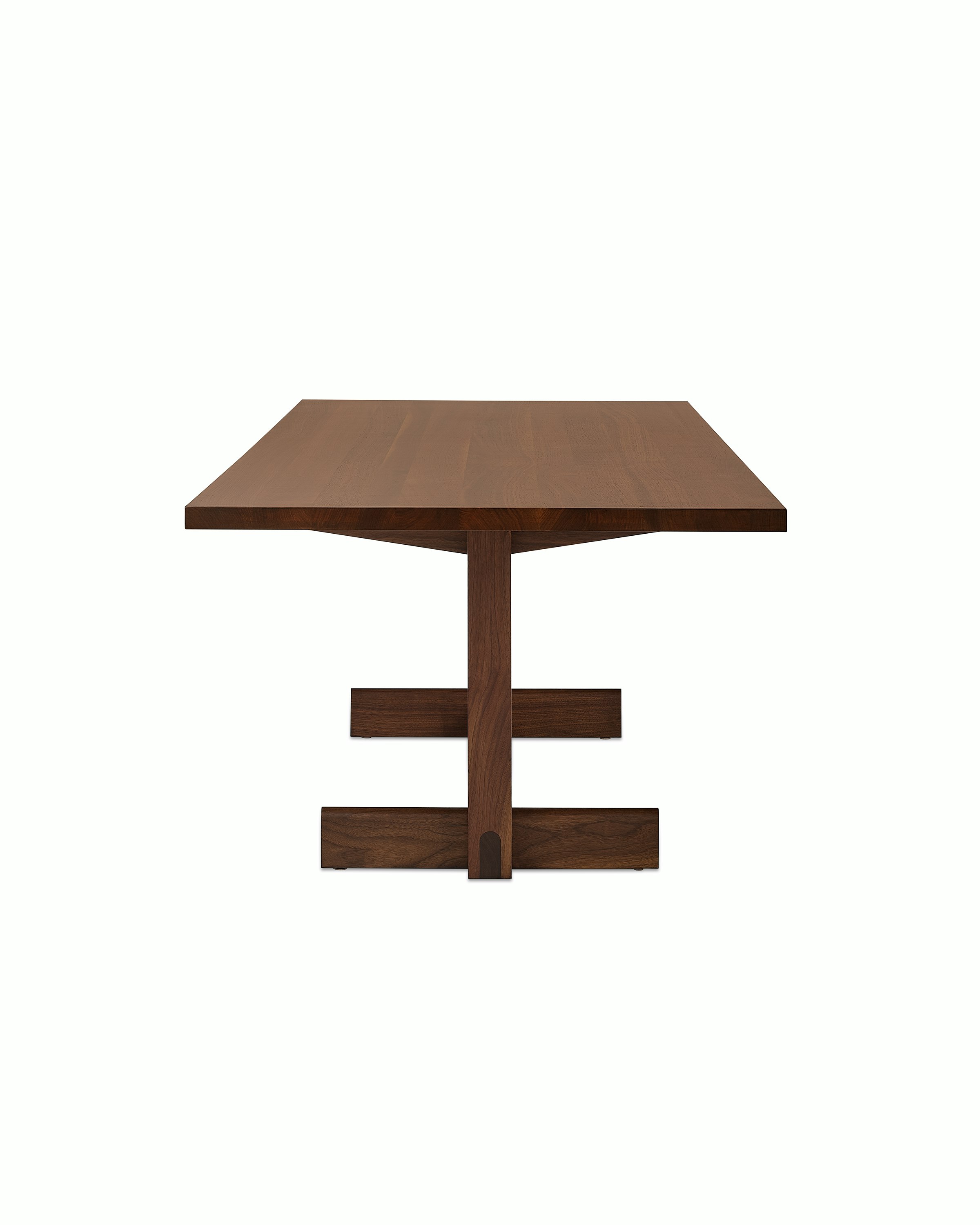 Dark brown Land Table, viewed from the side.