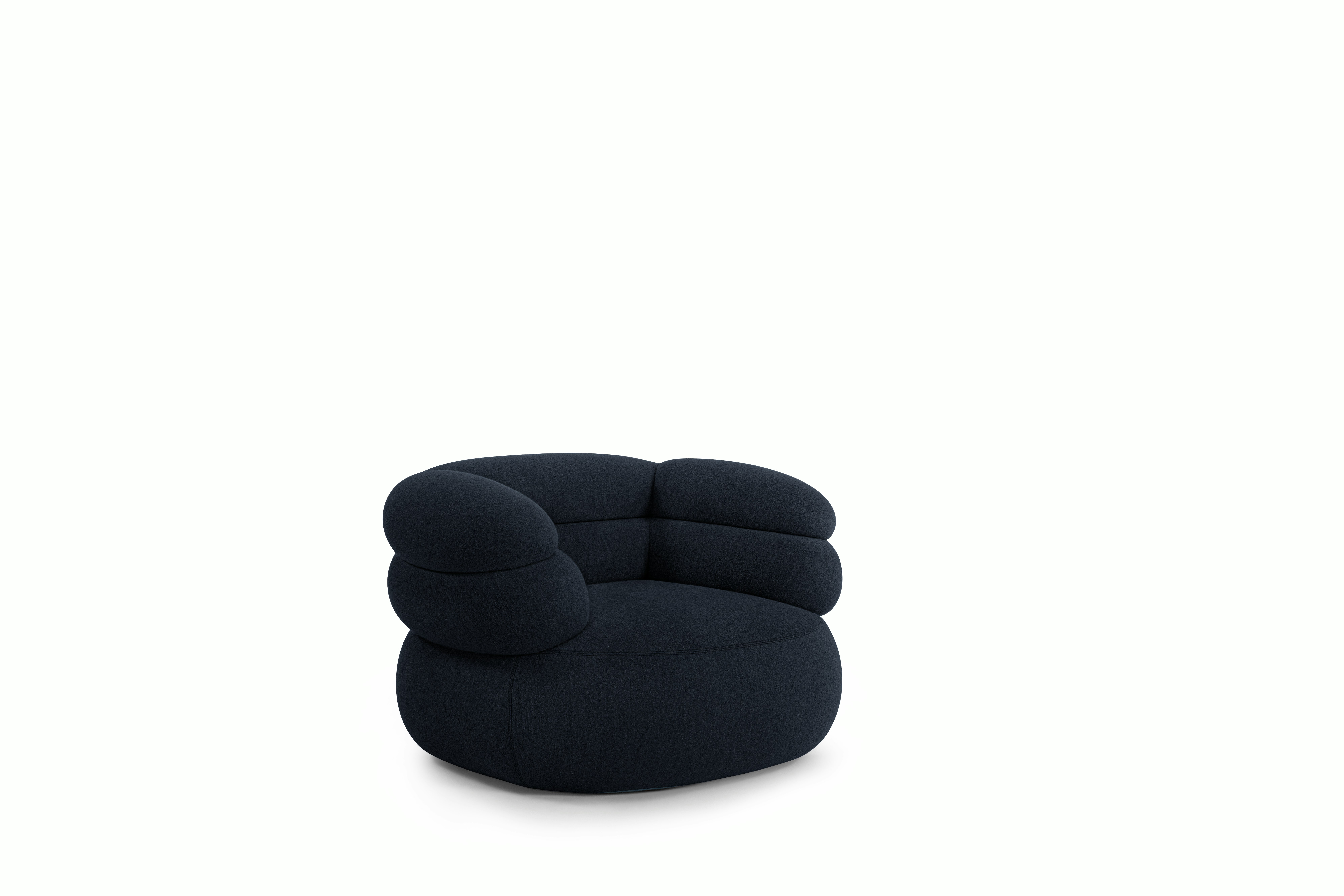 A Biboni Lounge Chair in Midnight Navy viewed from an angle.