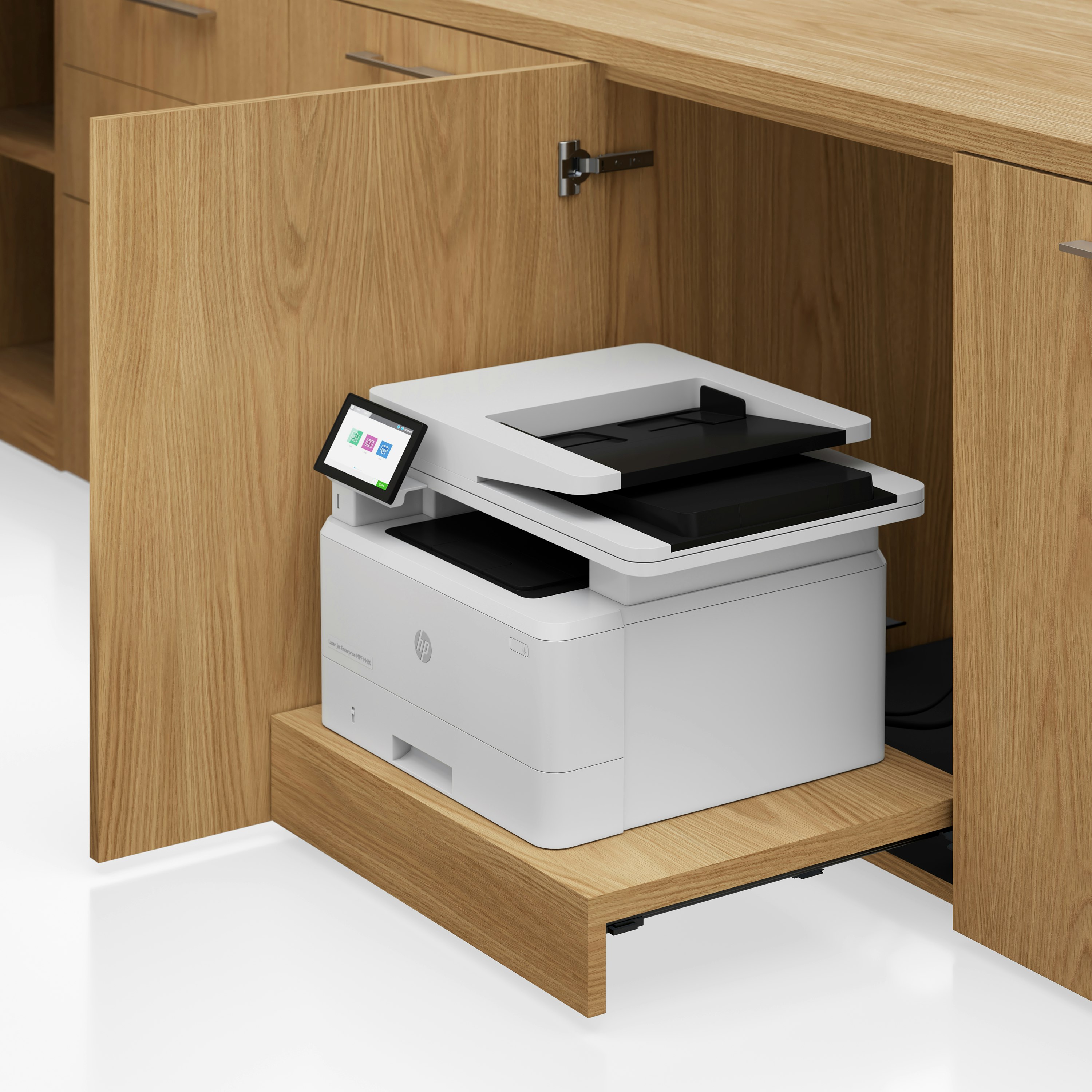 Detail shot of the Geiger One Casegoods printer drawer in Natural Flat Cut Oak viewed from an angle.