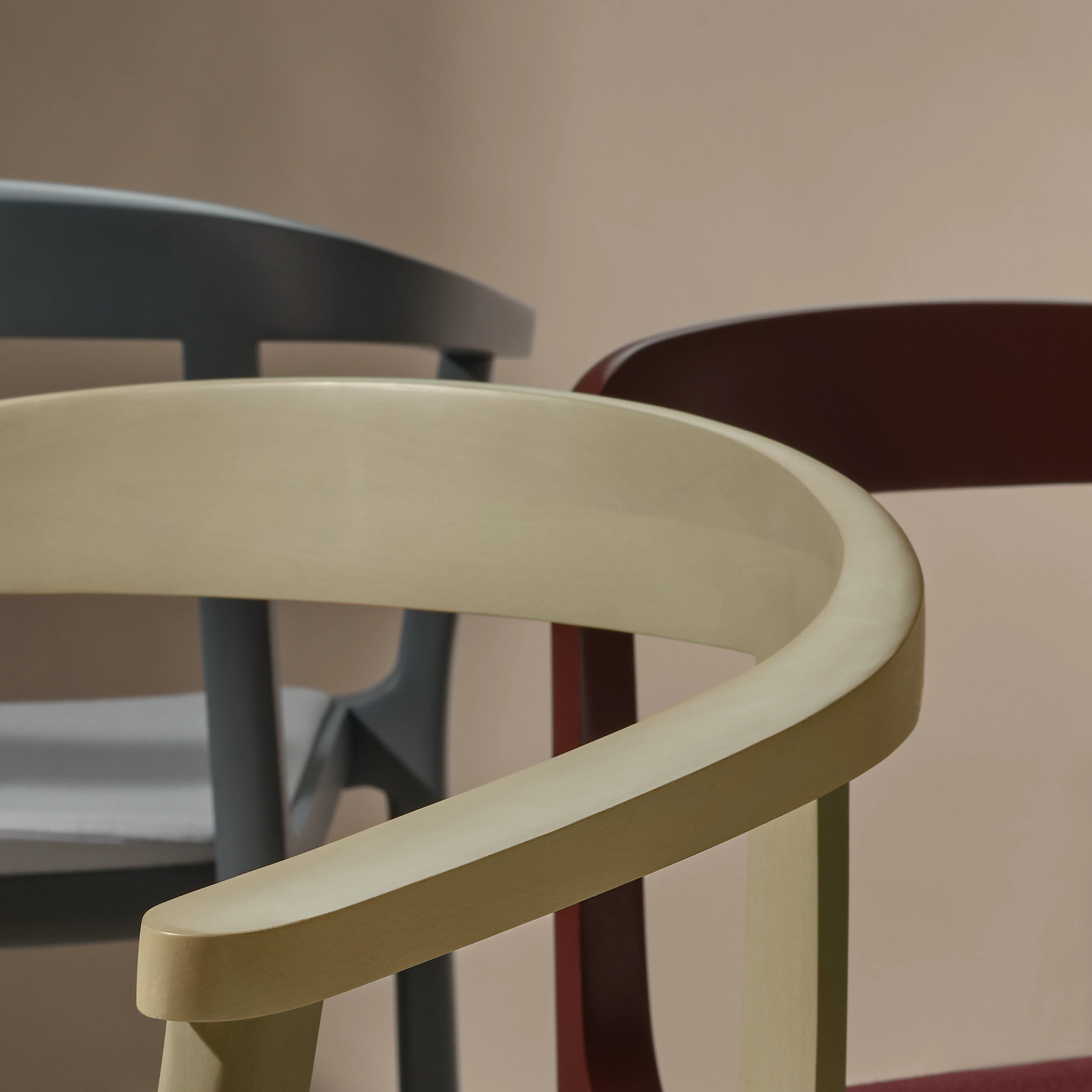Lijn Armchair and Side Chair by Carole Baijings for Geiger in Nordic Blue, Sundrift, and Red Clay, detail shot on a neutral background.