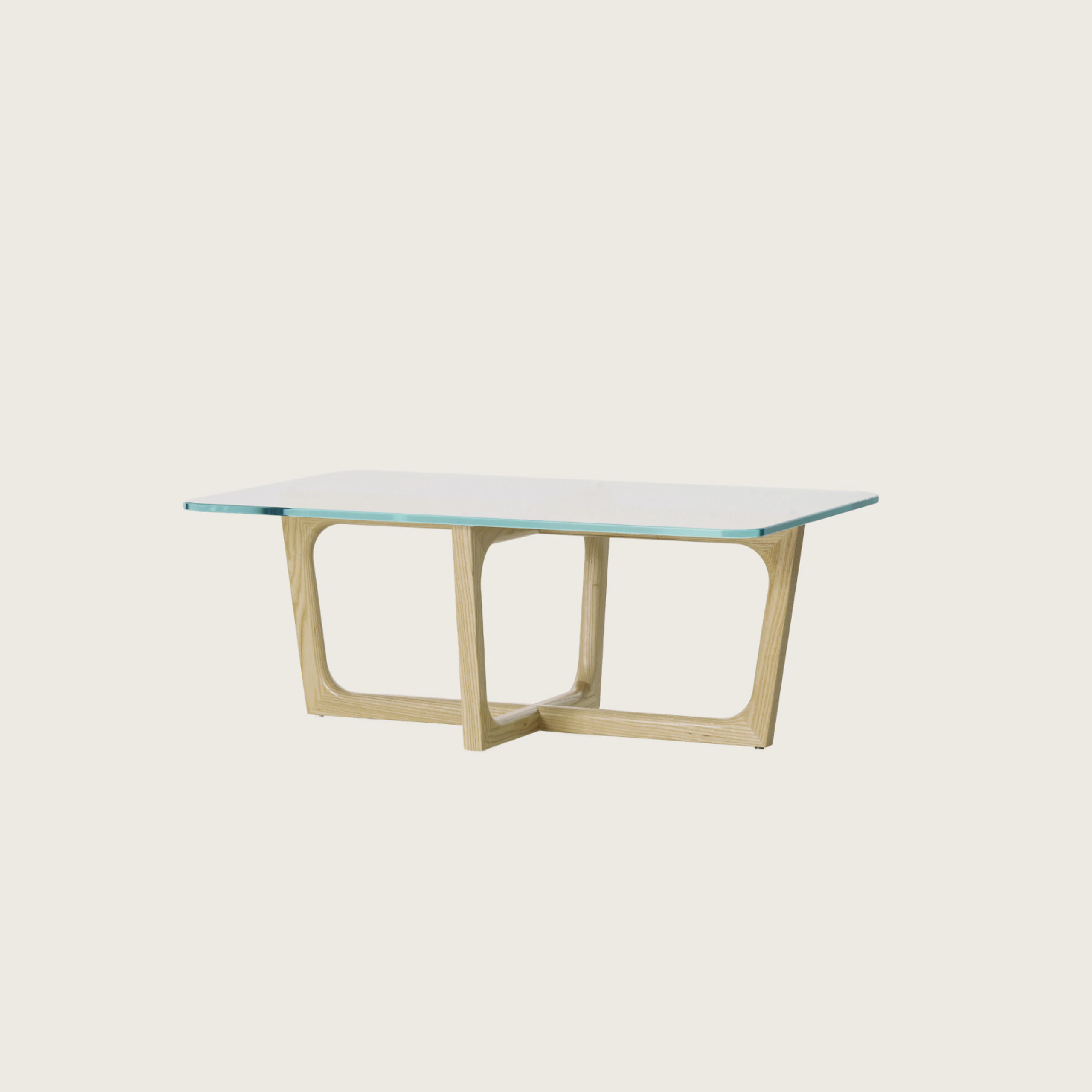 A rectangular Loophole coffee table with a light-ash base.