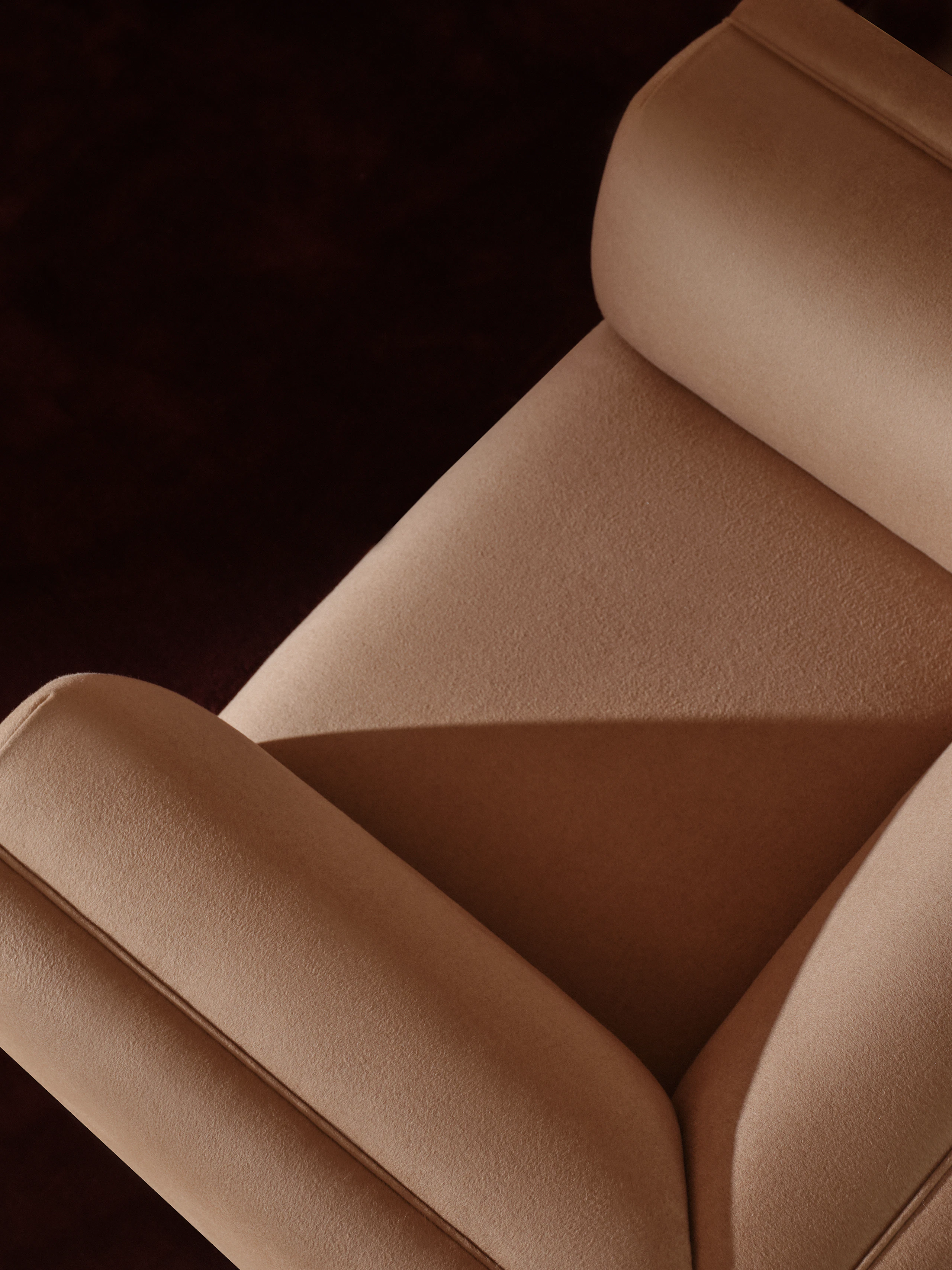 Detail shot from above of the Rolled Arm Club Chair in a brushed camel