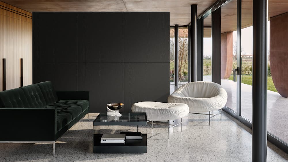 Bun Lounge Chair and Ottoman in Haven Ivory, Florence Knoll Sofa in Iseo Dark Green and D'Urso Coffee Table