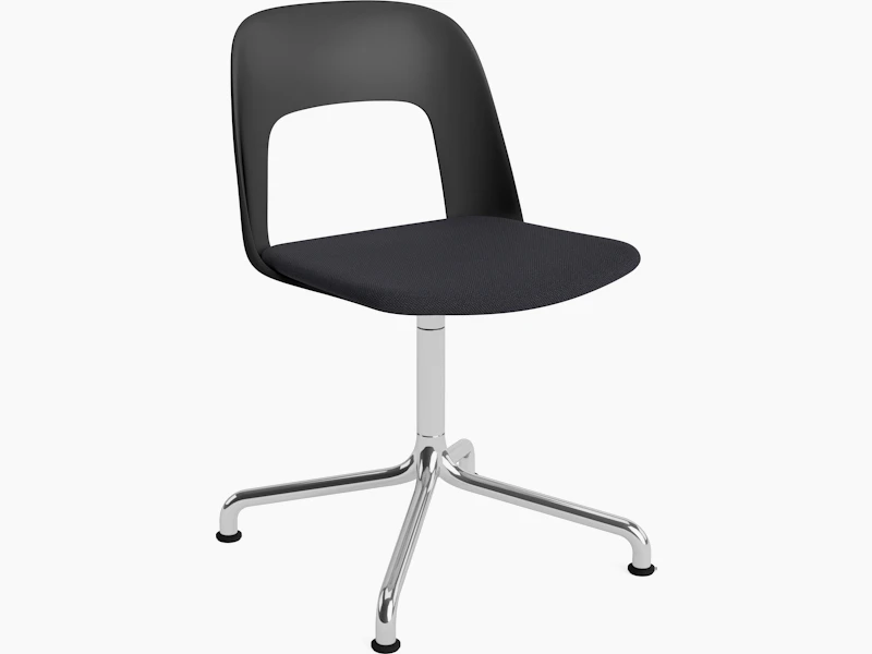 Layout Chair black polypropylene arm shell with matching black aluminum upholstered seat on polished aluminum arc base, front angled view