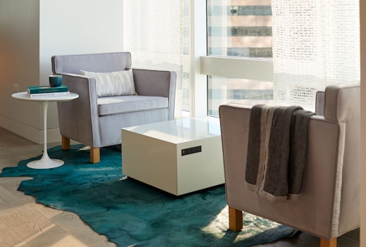 Krefeld lounge chair KnollExtra Power Cube Saarinen side table Edelman Kyle Bunting rug refuge focus shared spaces